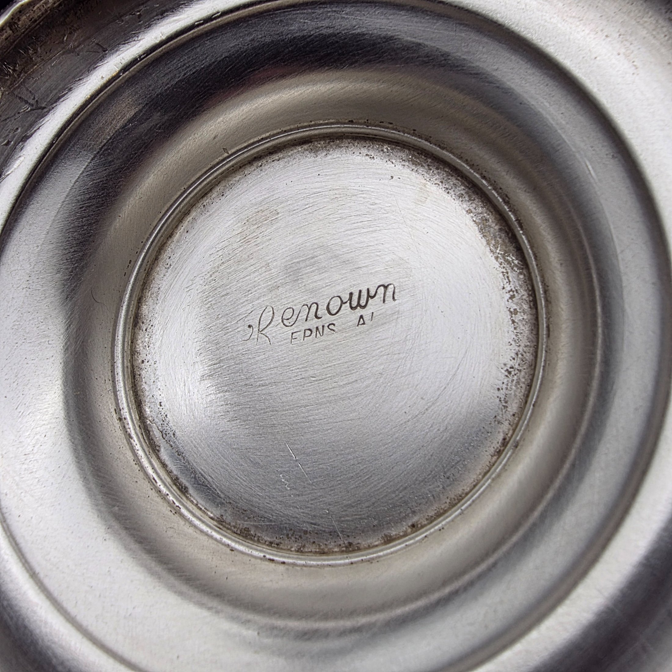 A vintage Renown EPNS A1 (Electro-Plated Nickel Silver) cocktail shaker or jug with a spouted design, handle, and a removable lid, dating from the mid-20th century. - View 7