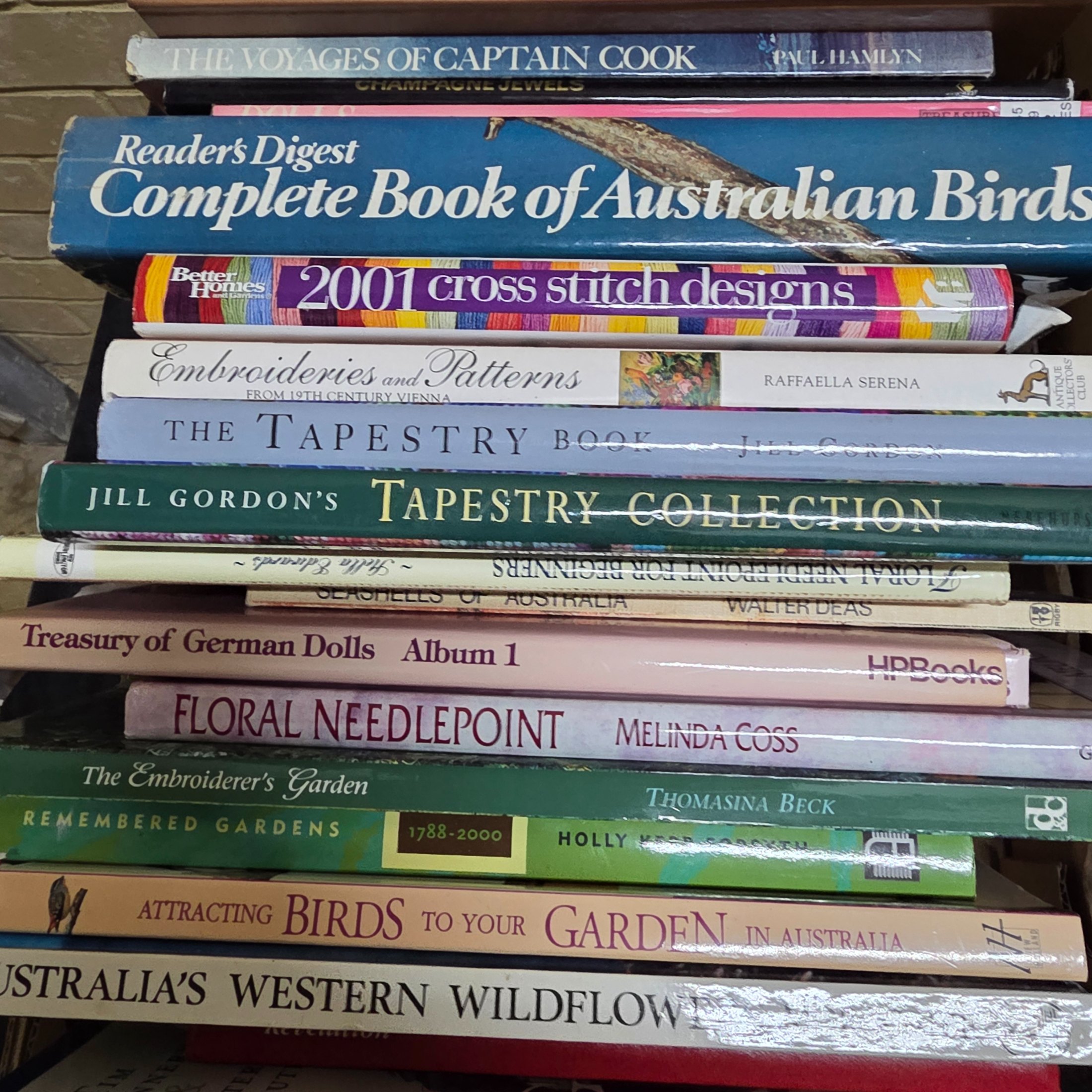 A diverse collection of pre-owned books spanning various genres, including fiction, non-fiction, nature, craft, and history, presented in several cardboard boxes. - View 8