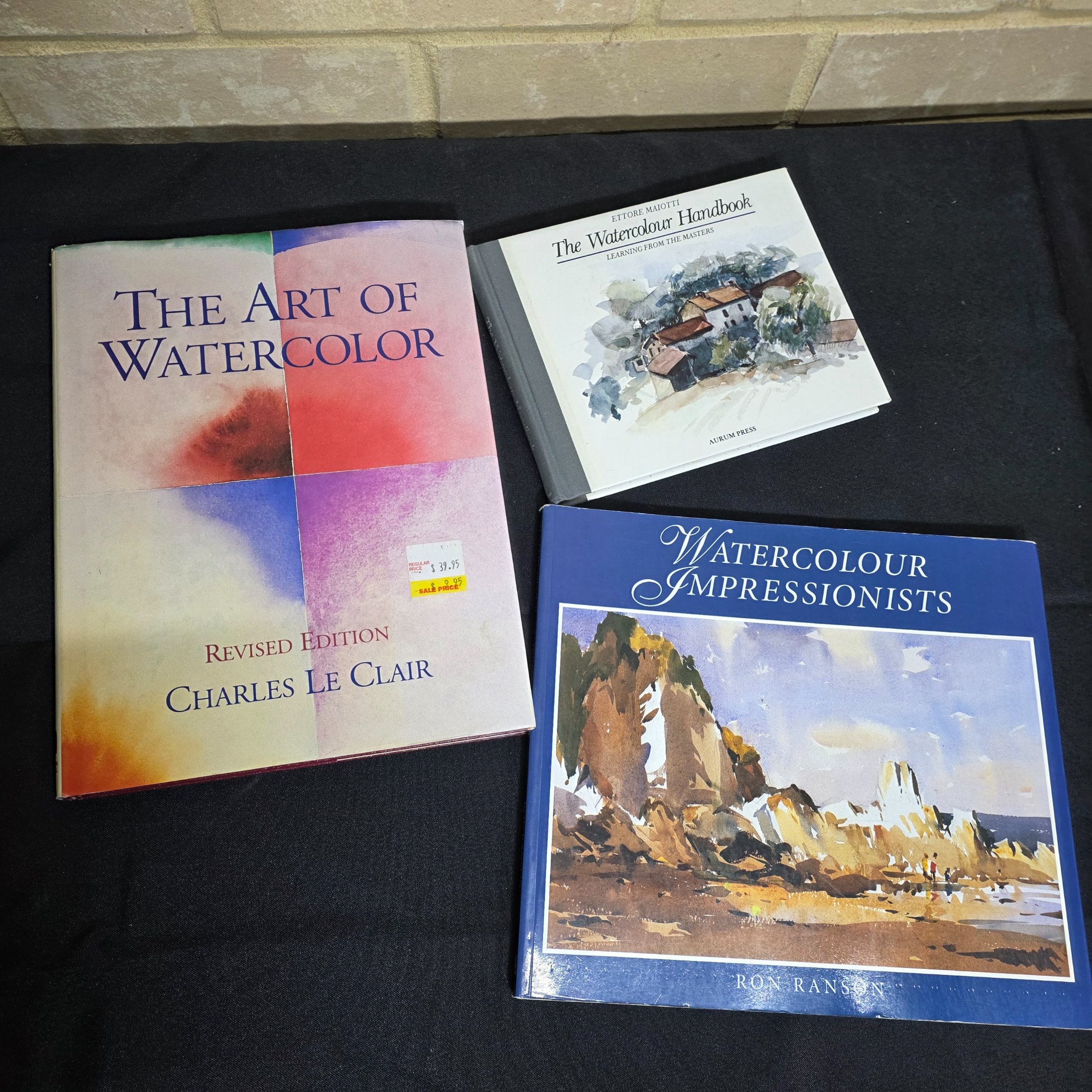 A comprehensive collection of approximately 15 books dedicated to the art and techniques of watercolor painting, featuring various instructional guides and authors. - View 7