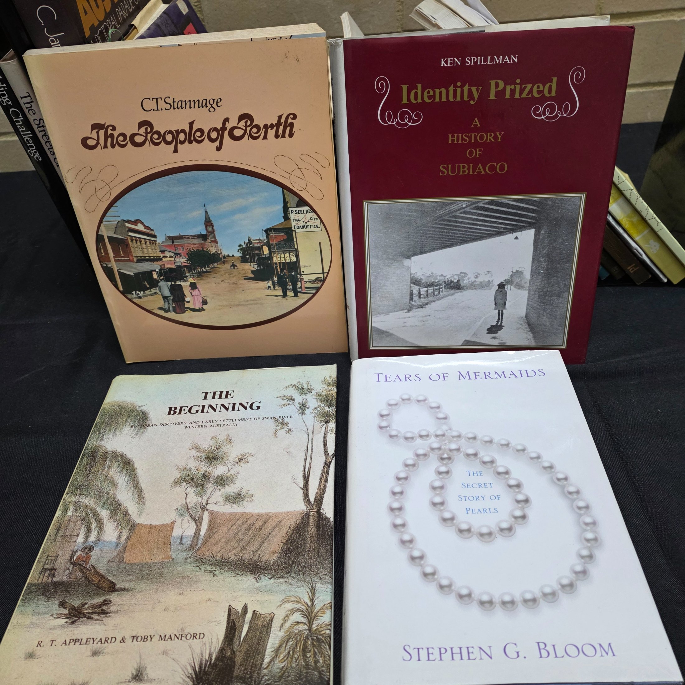 A substantial collection of books and magazines detailing the history, culture, and natural beauty of Western Australia, including specific regional studies and general overviews. - View 4