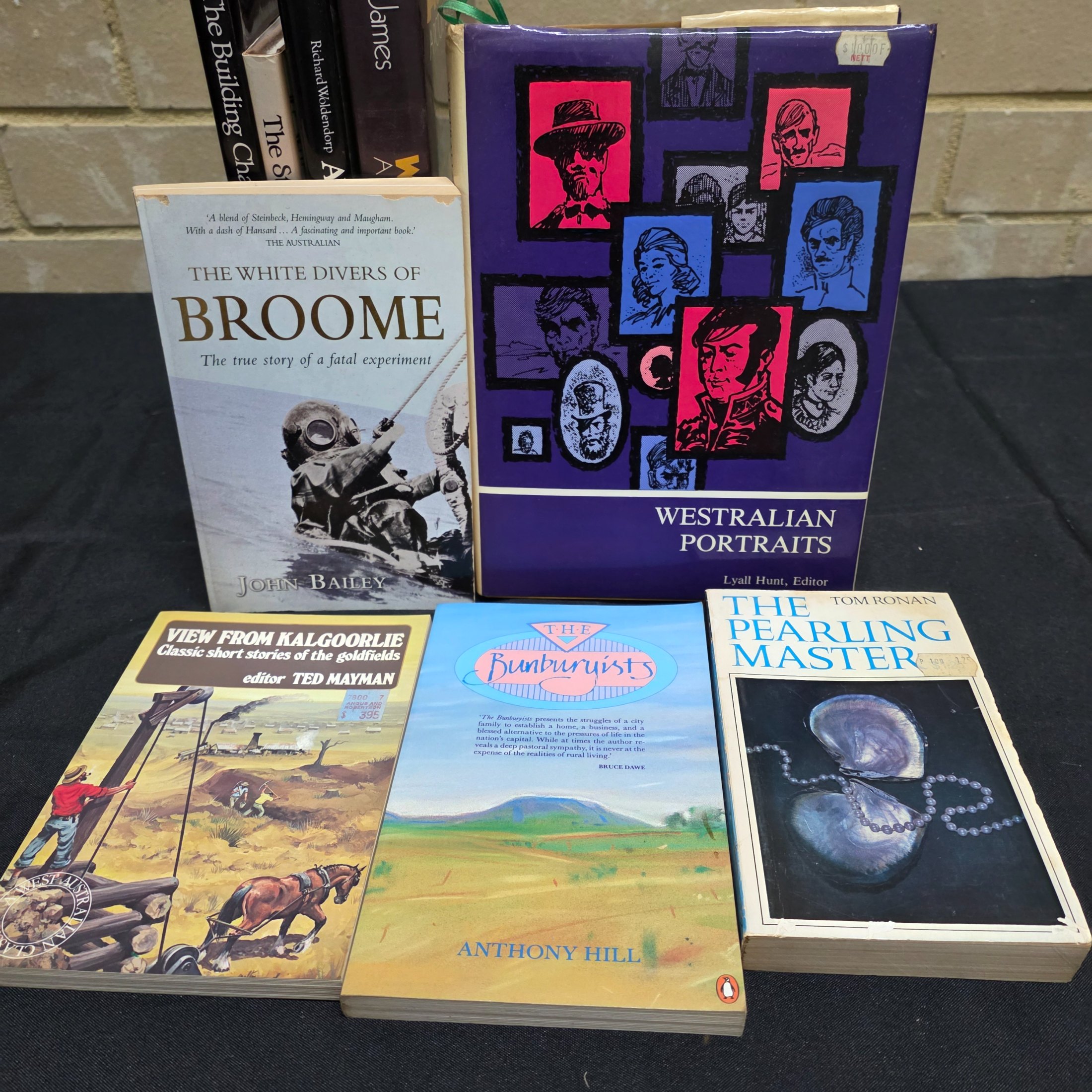 A substantial collection of books and magazines detailing the history, culture, and natural beauty of Western Australia, including specific regional studies and general overviews. - View 8