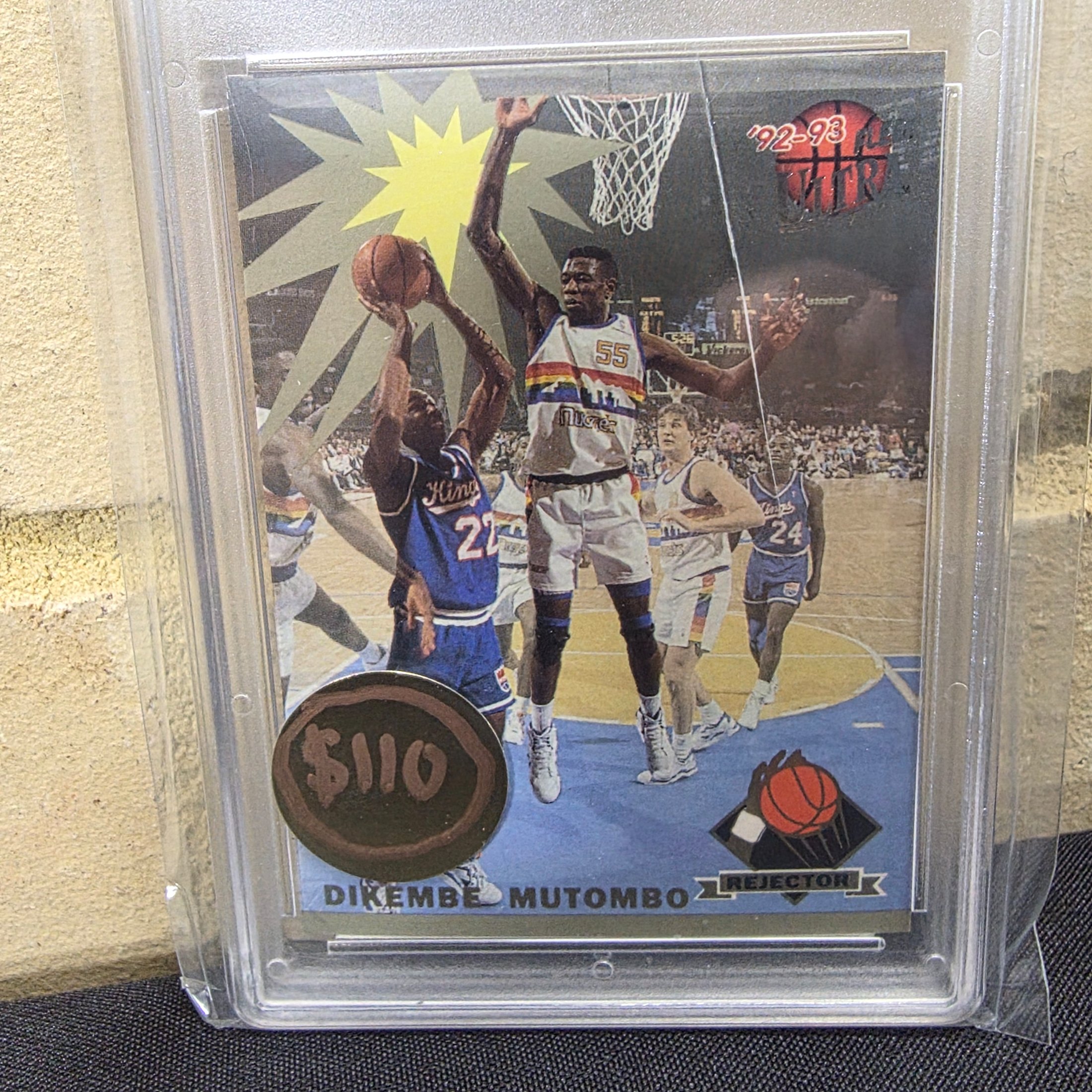 A professionally graded 1992 Fleer Ultra Rejector #2 basketball trading card featuring Dikembe Mutombo, achieving a GEM-MT 10 grade from GMC Grading. - View 2