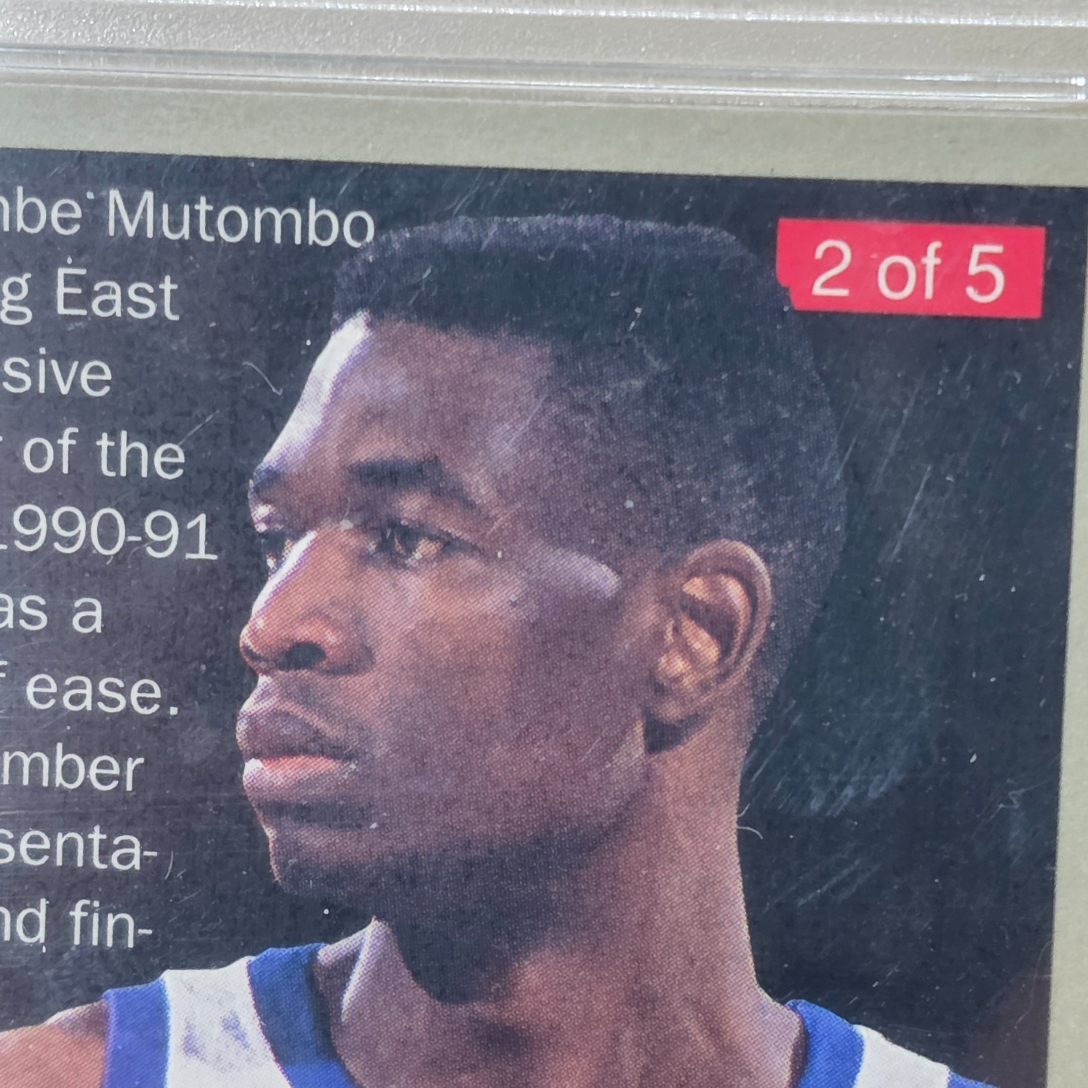 A professionally graded 1992 Fleer Ultra Rejector #2 basketball trading card featuring Dikembe Mutombo, achieving a GEM-MT 10 grade from GMC Grading. - View 7