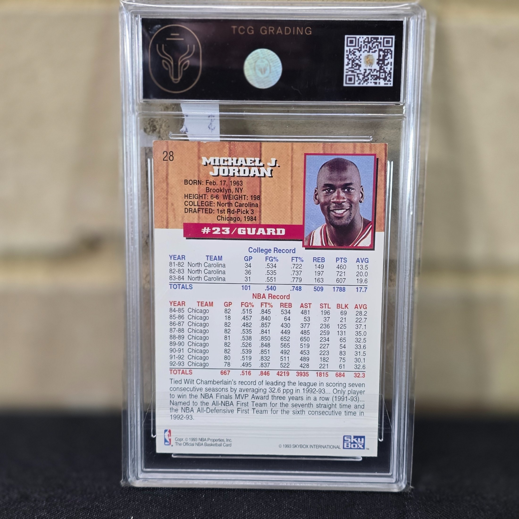 A 1993 Skybox NBA Hoops Michael Jordan #28 basketball trading card, professionally graded 6.5 (EX-NM+) by TCG Grading, featuring the iconic Chicago Bulls player. - View 3