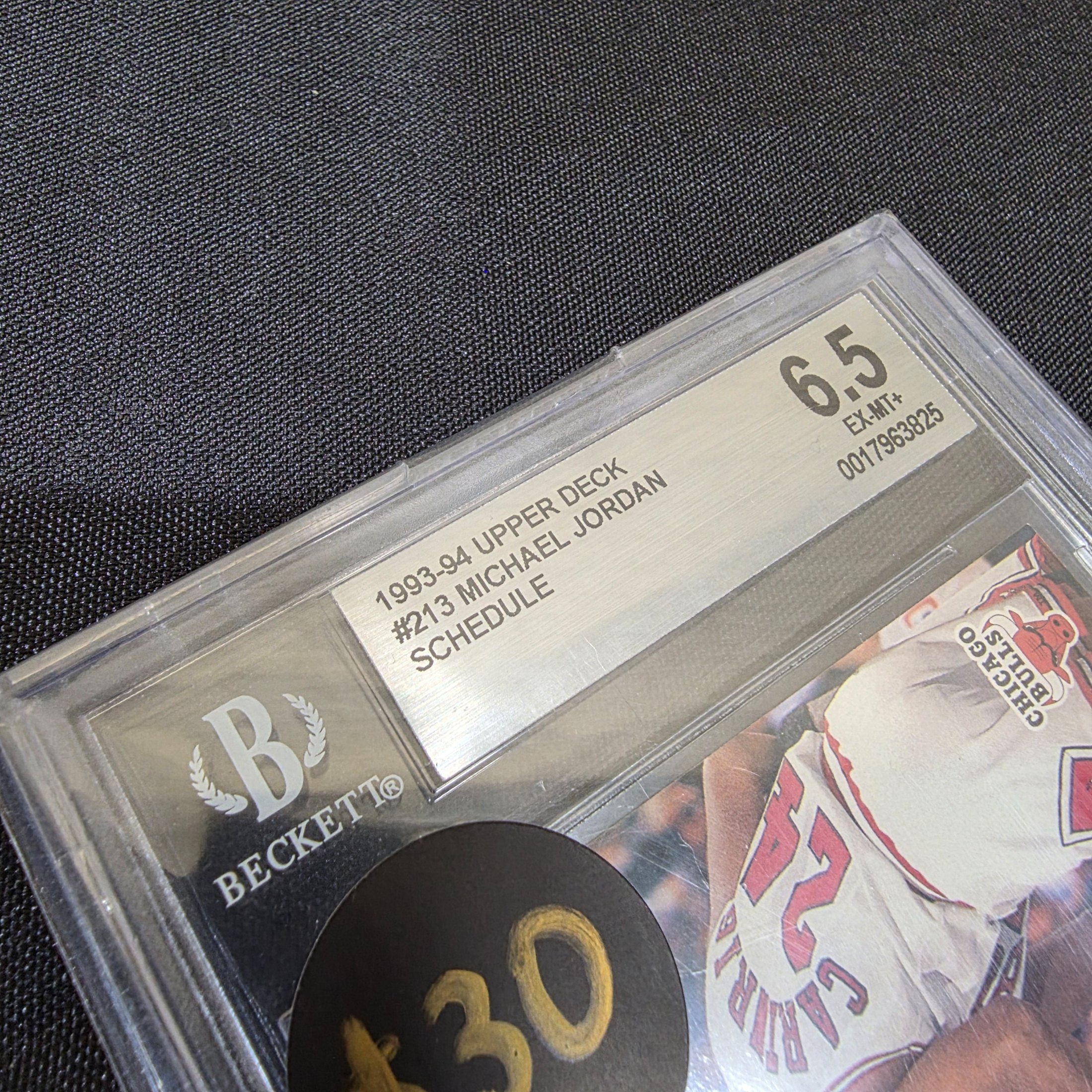 A professionally graded 1993-94 Upper Deck Michael Jordan #213 Schedule basketball card, encapsulated by Beckett Grading Services (BGS) with a grade of 6.5 EX-MT+. - View 3