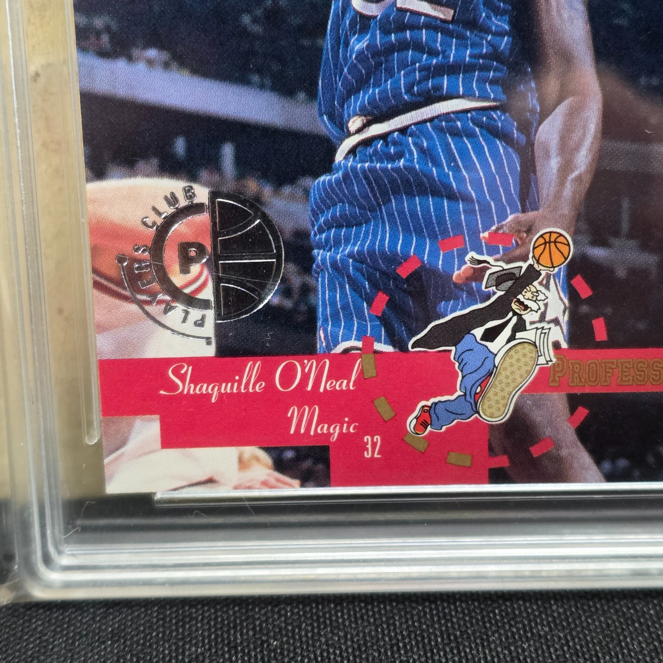 A 1995 Upper Deck Collector's Choice NBA Shaquille O'Neal #202 Player's Club basketball card, professionally graded 6.5 EX/NM+ by TCG Grading, encased in a protective slab. - View 3