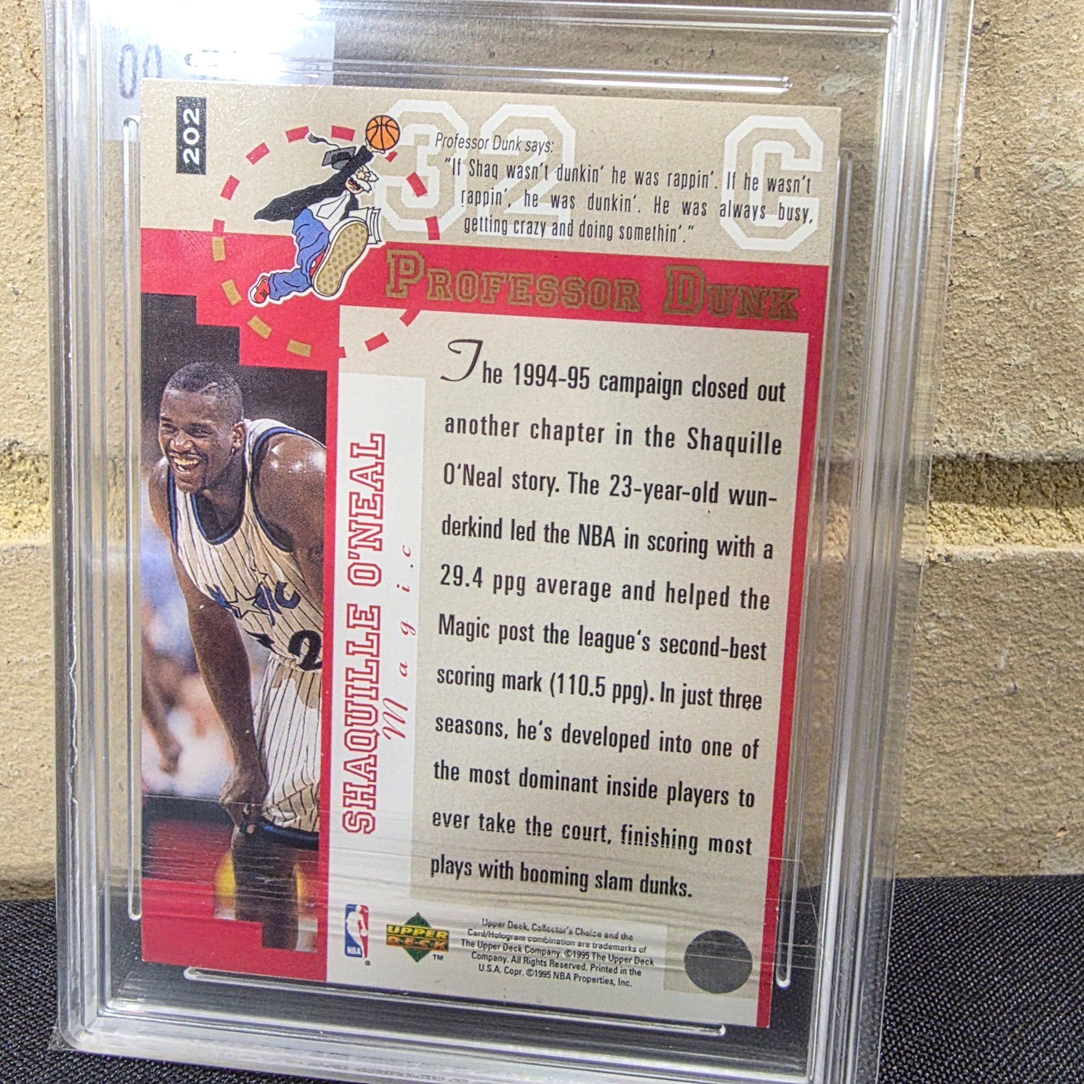 A 1995 Upper Deck Collector's Choice NBA Shaquille O'Neal #202 Player's Club basketball card, professionally graded 6.5 EX/NM+ by TCG Grading, encased in a protective slab. - View 6