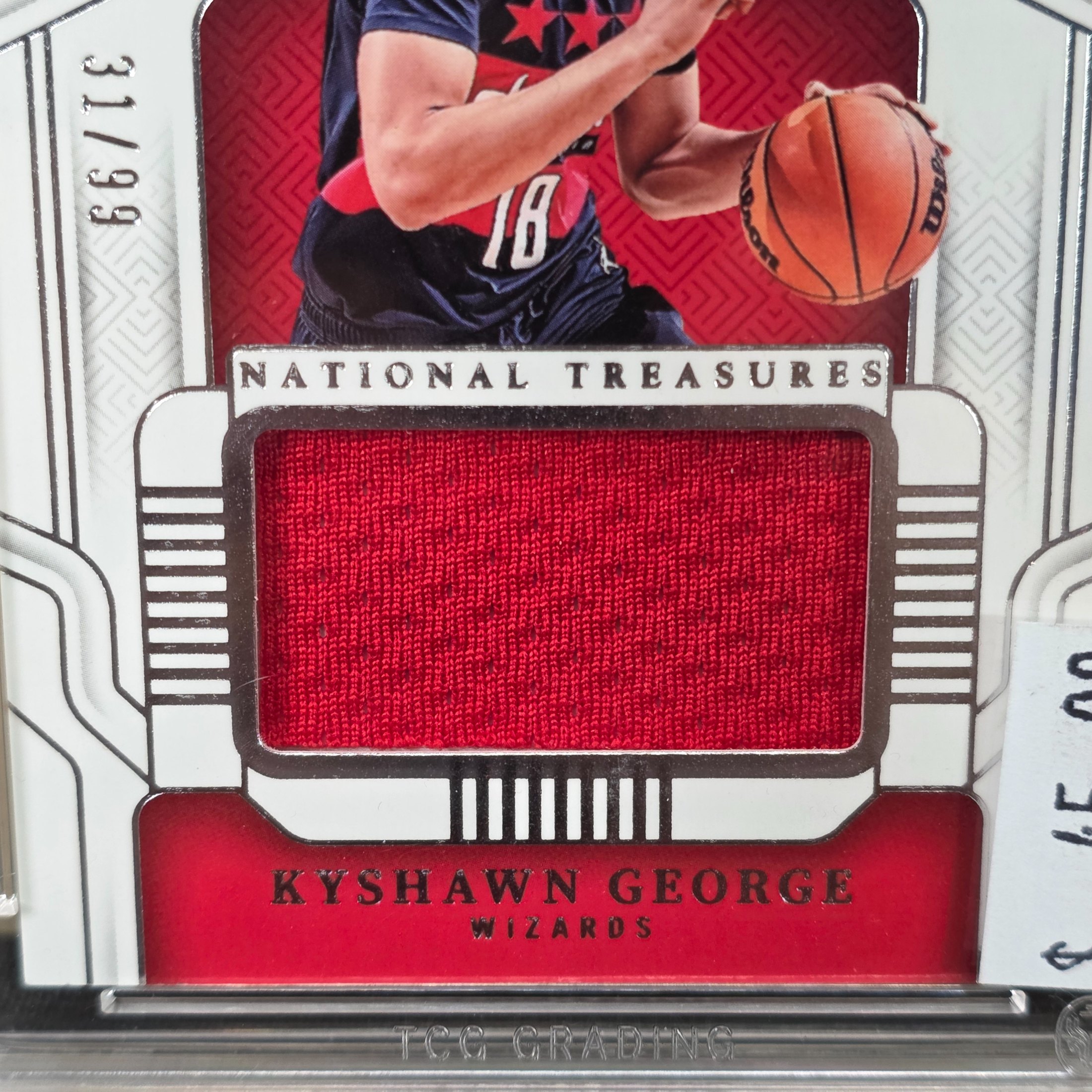 A 2025 Panini National Treasures NBA Kyshawn George Rookie Materials trading card, graded 8 NM/MT by TCG Grading, featuring a jersey patch. - View 3