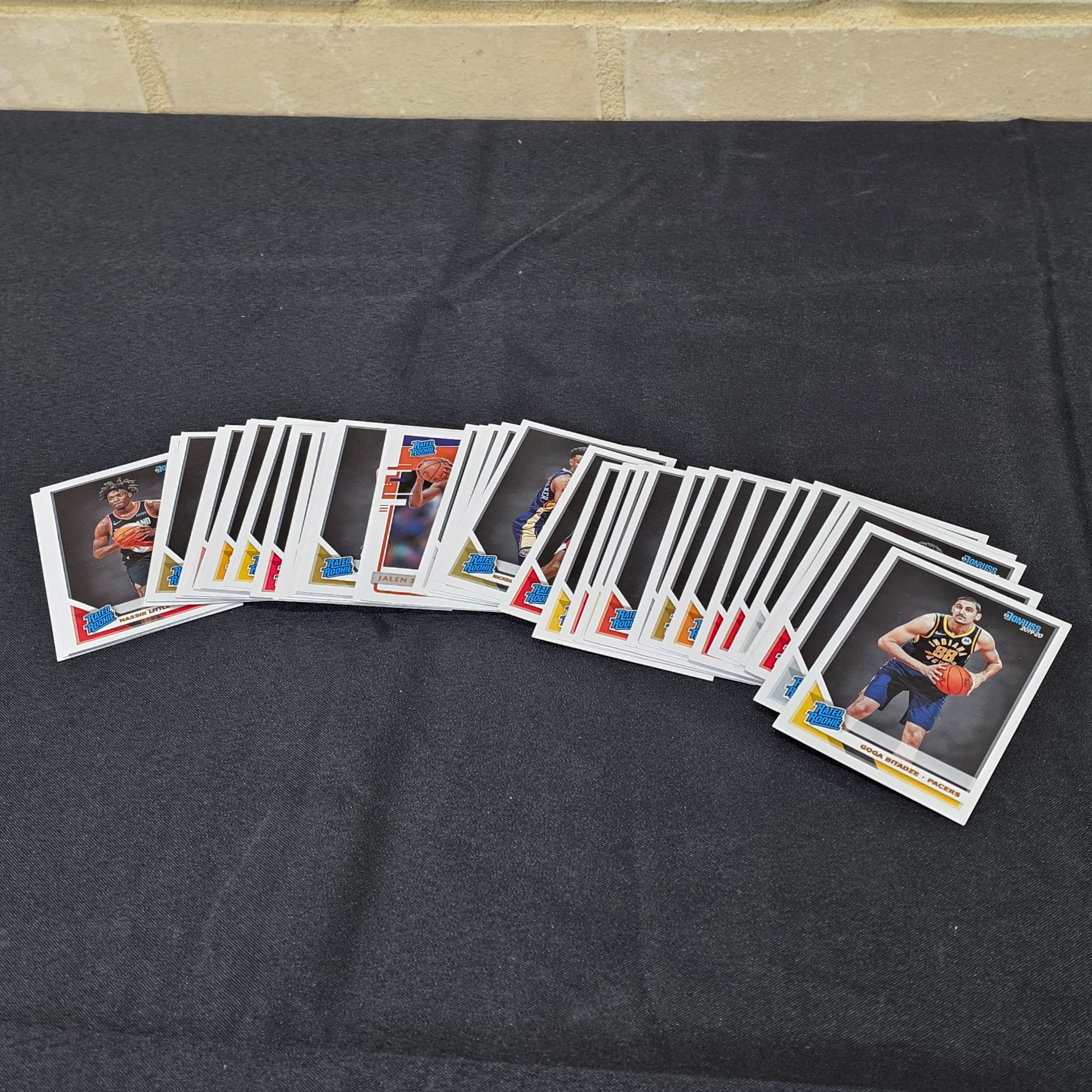 A collection of 2019-20 Donruss NBA basketball trading cards, predominantly featuring 'Rated Rookie' cards from the season. - View 2