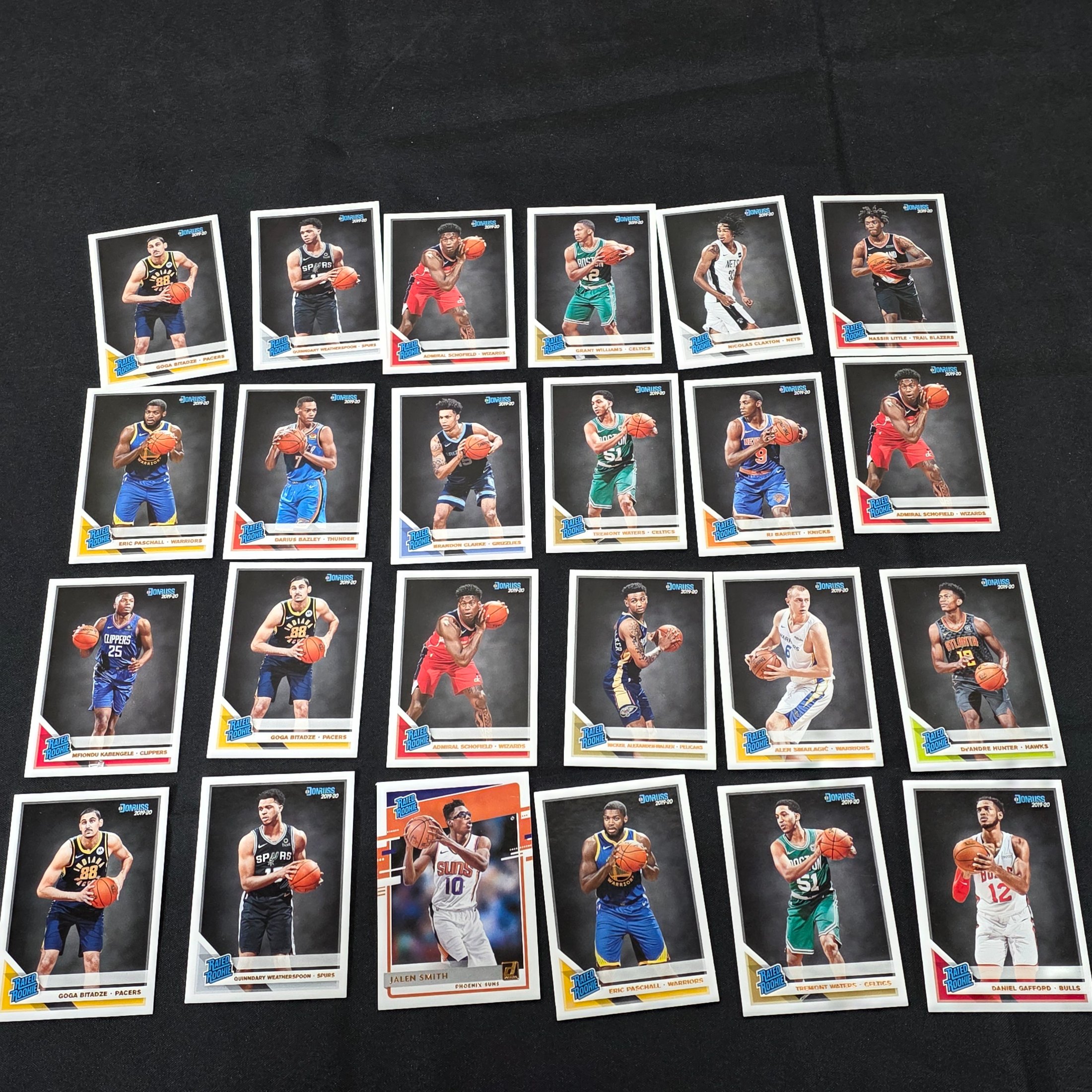 A collection of 2019-20 Donruss NBA basketball trading cards, predominantly featuring 'Rated Rookie' cards from the season. - View 3