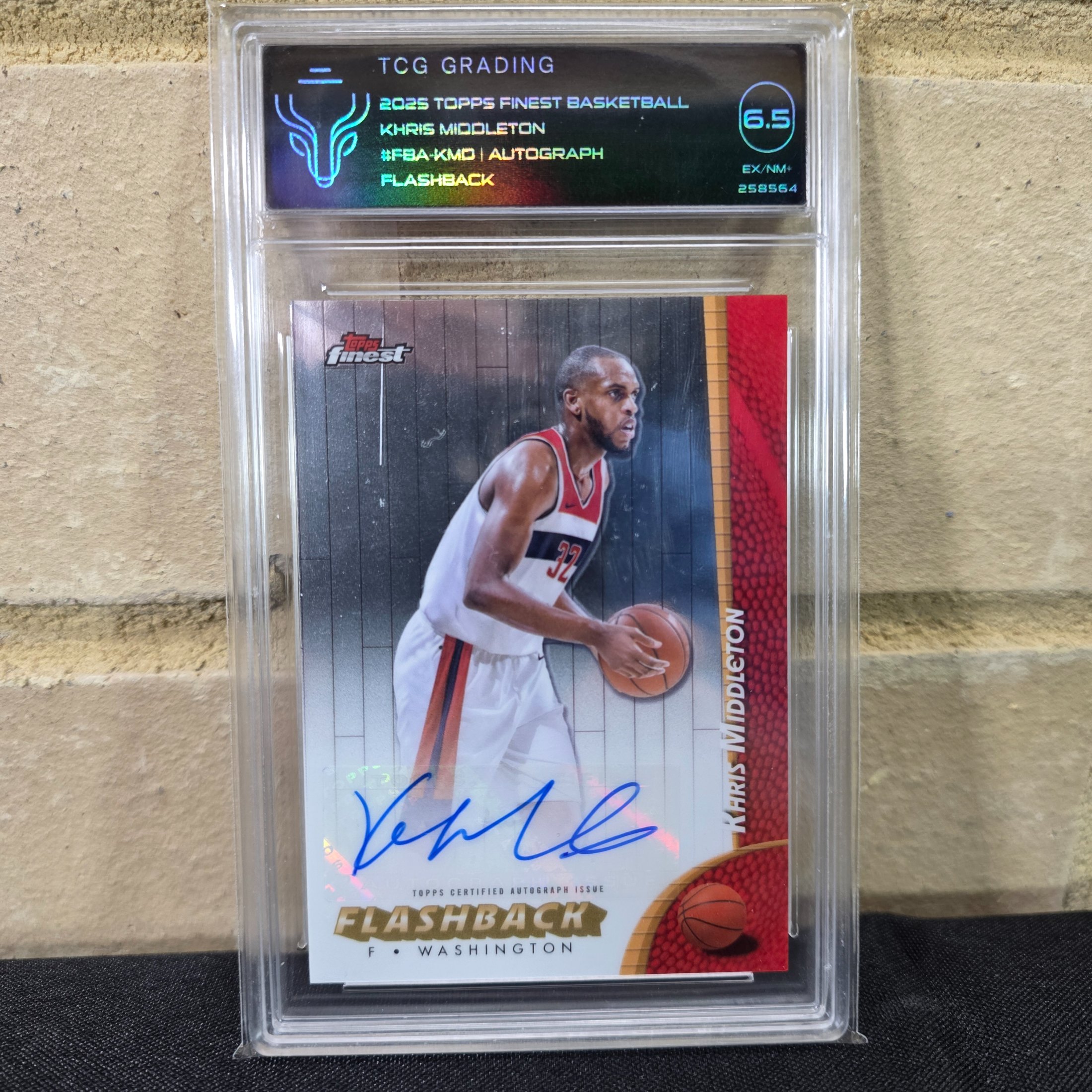 A graded 2025 Topps Finest Basketball trading card featuring an autographed Flashback insert of NBA player Khris Middleton, encapsulated by TCG Grading with a grade of 6.5 EX/NM+.