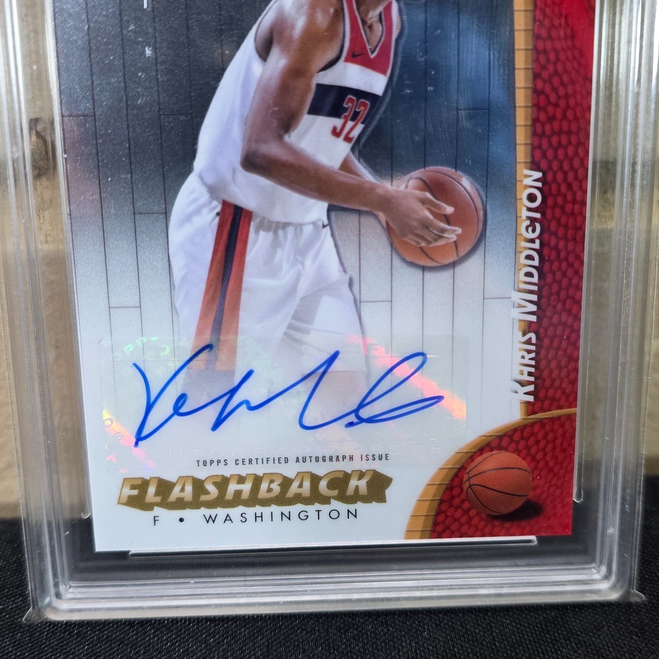 A graded 2025 Topps Finest Basketball trading card featuring an autographed Flashback insert of NBA player Khris Middleton, encapsulated by TCG Grading with a grade of 6.5 EX/NM+. - View 2