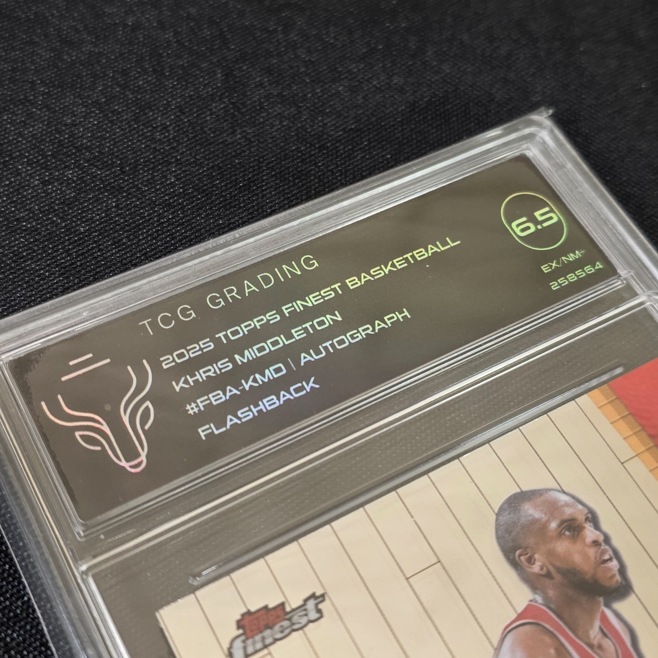 A graded 2025 Topps Finest Basketball trading card featuring an autographed Flashback insert of NBA player Khris Middleton, encapsulated by TCG Grading with a grade of 6.5 EX/NM+. - View 3