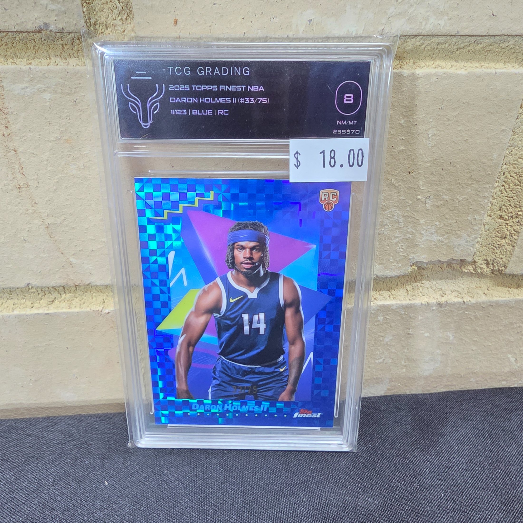 A 2025 Topps Finest NBA Daron Holmes II Blue parallel Rookie Card, graded NM-MT 8 by TCG Grading, individually numbered 33 out of 75.