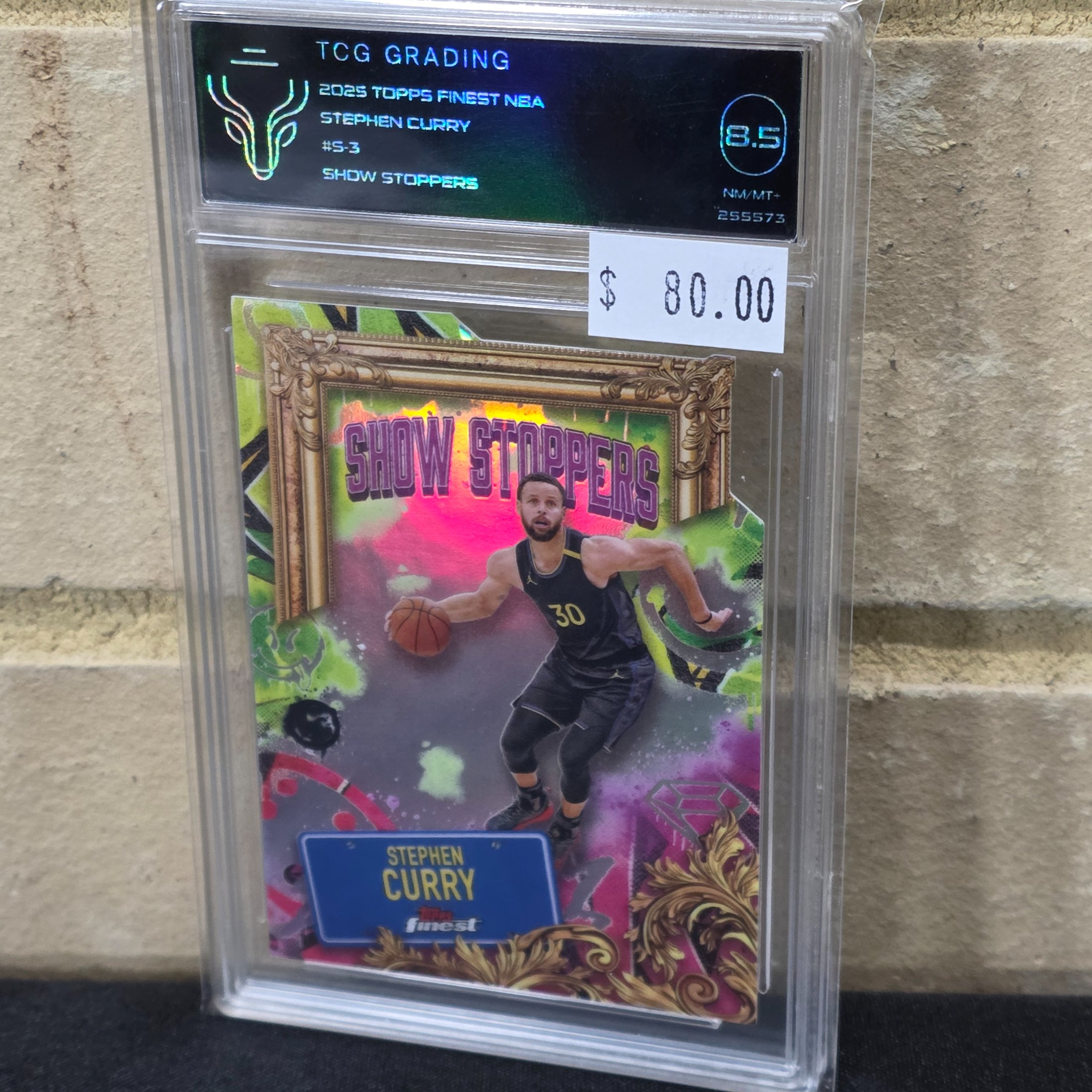 A professionally graded 2025 Topps Finest NBA Stephen Curry 'Show Stoppers' trading card, graded 8.5 NM-MT+ by TCG Grading. - View 2