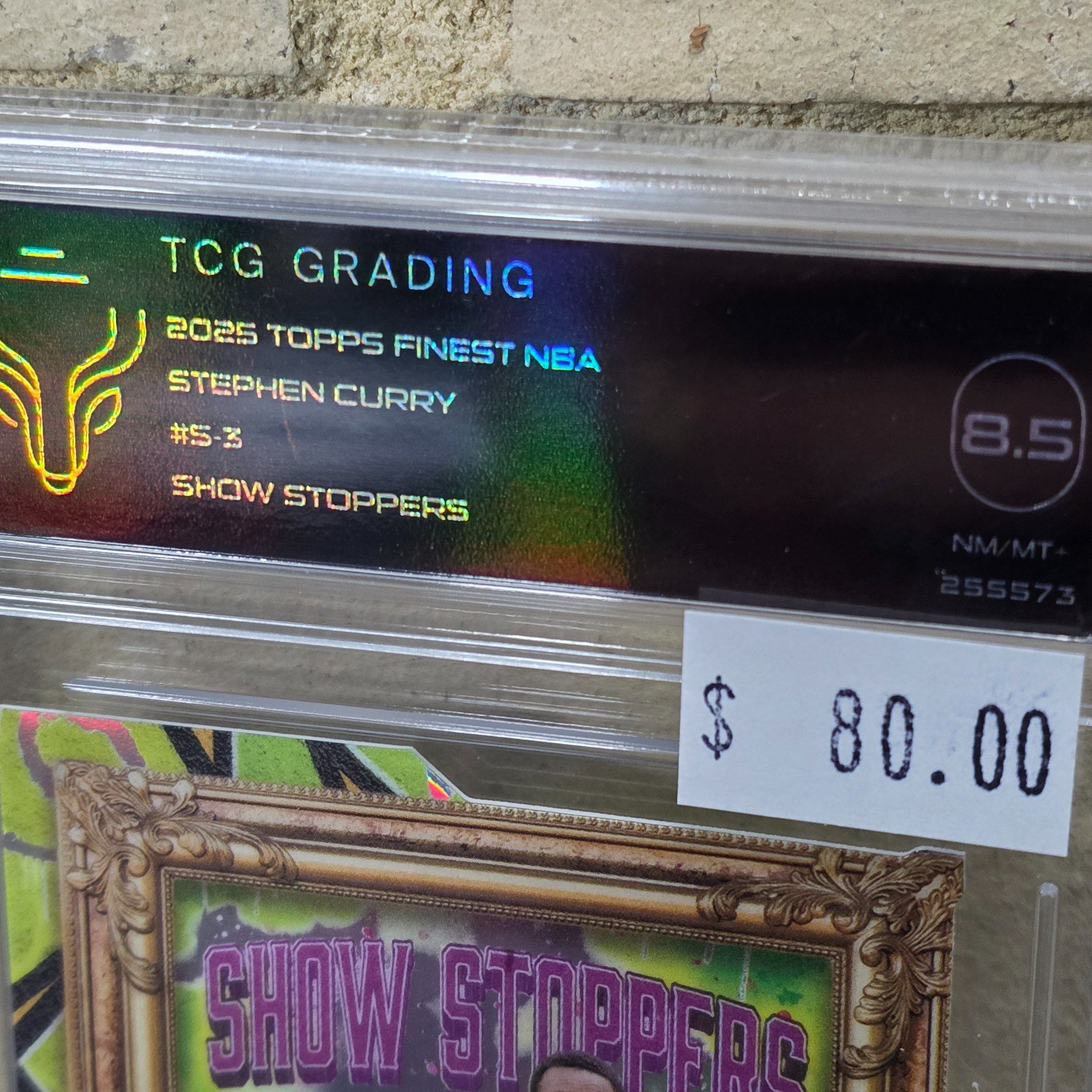 A professionally graded 2025 Topps Finest NBA Stephen Curry 'Show Stoppers' trading card, graded 8.5 NM-MT+ by TCG Grading. - View 3