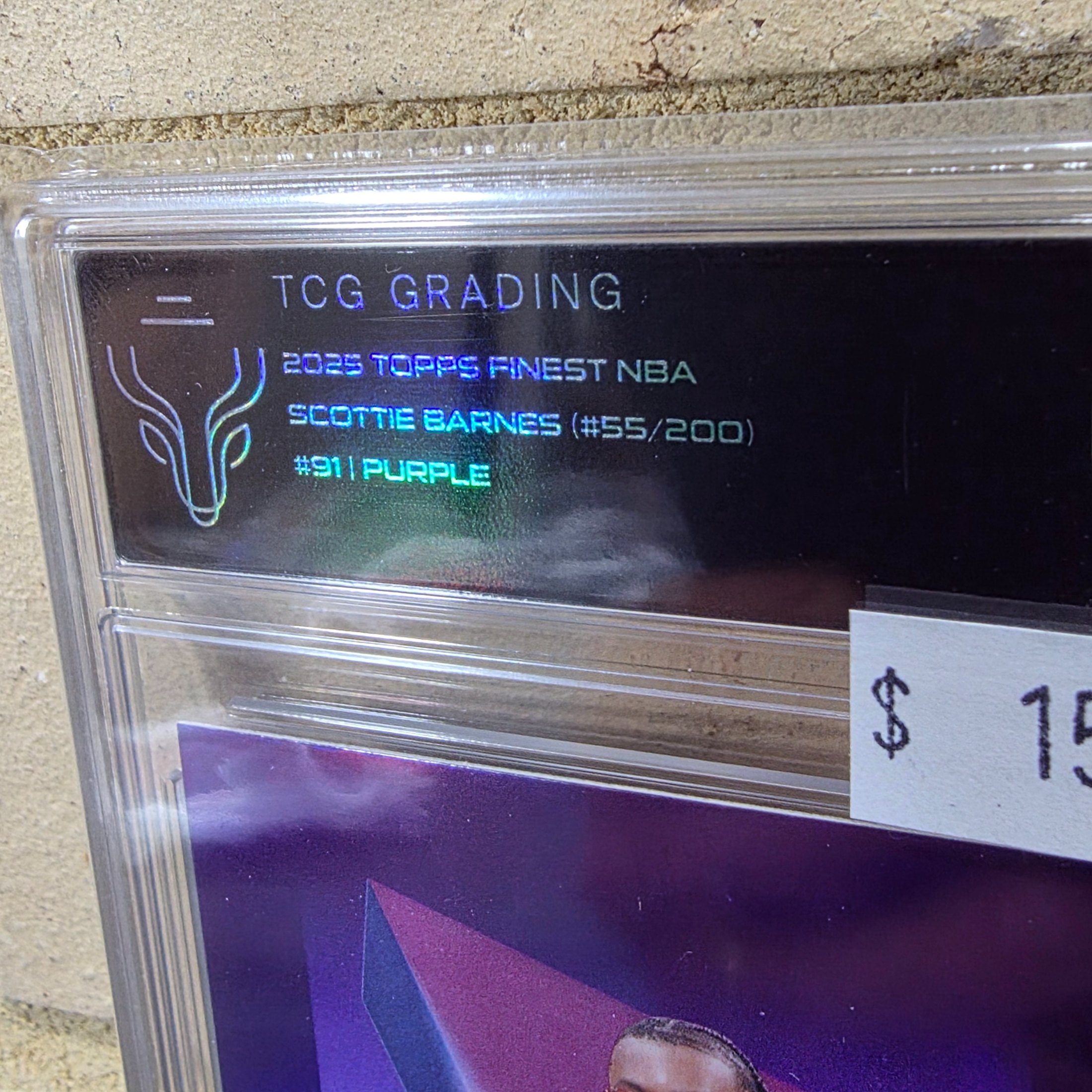 A graded 2025 Topps Finest NBA Scottie Barnes #911 Purple parallel basketball trading card, numbered 55/200, encapsulated in a TCG Grading slab with a grade of 7.5 NM-. - View 2