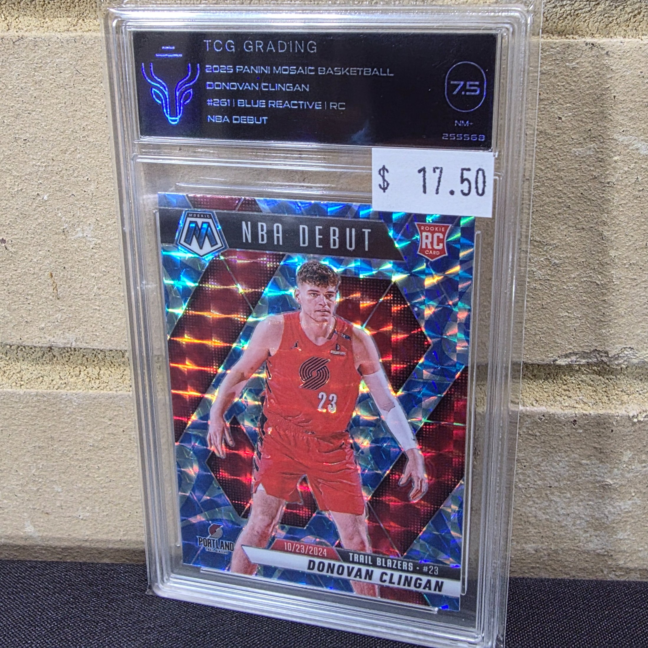 A professionally graded 2025 Panini Mosaic Basketball rookie card featuring Donovan Clingan, encased in a TCG Grading slab with a grade of 7.5 (NM+).
