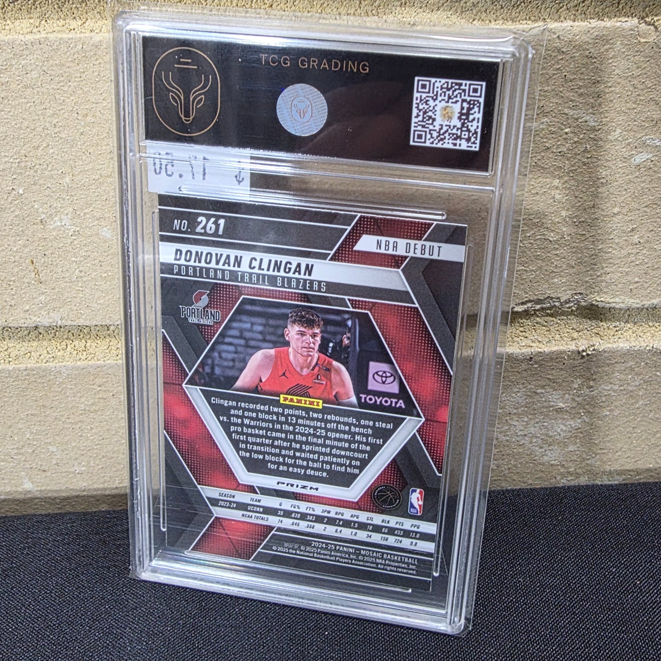 A professionally graded 2025 Panini Mosaic Basketball rookie card featuring Donovan Clingan, encased in a TCG Grading slab with a grade of 7.5 (NM+). - View 3