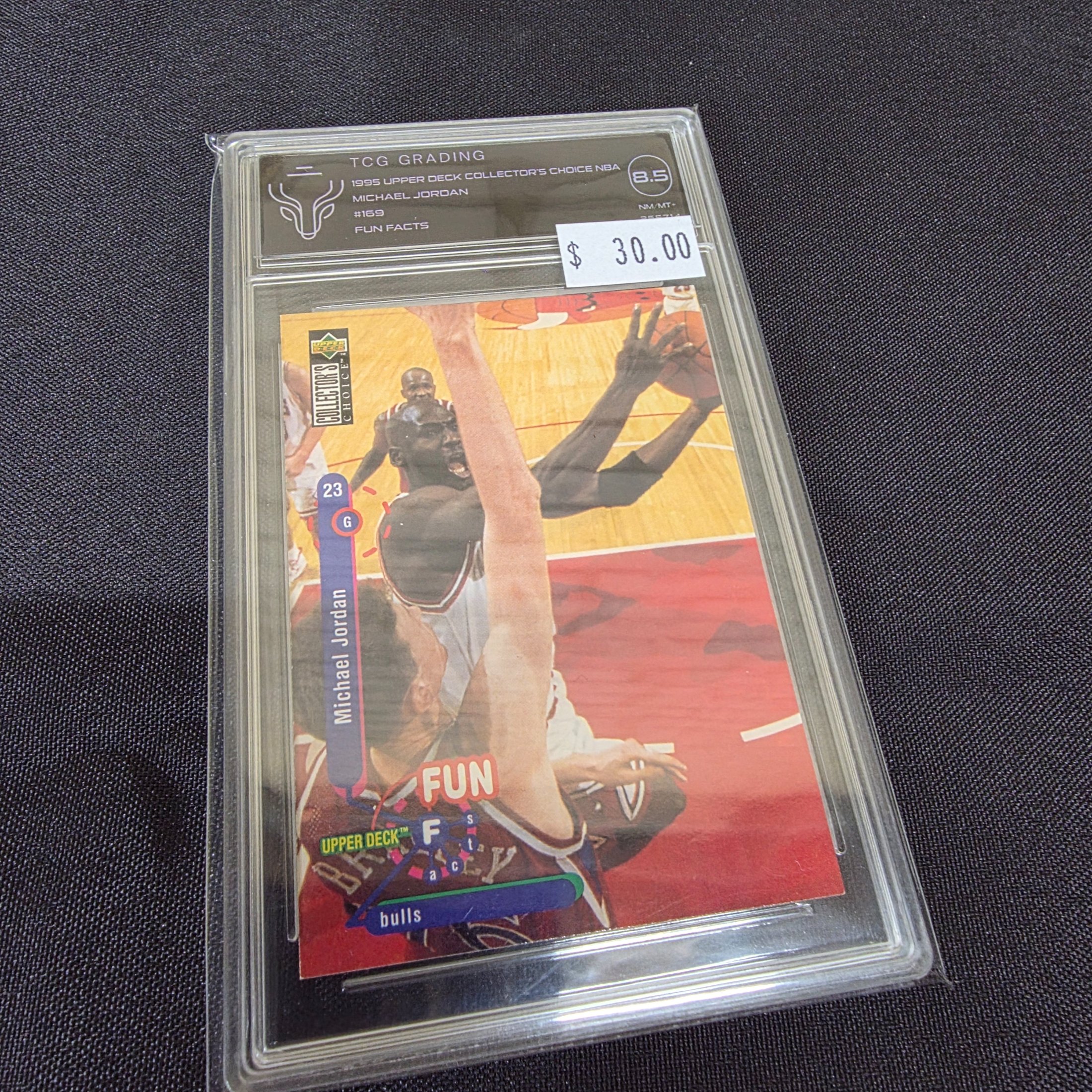 A professionally graded 1995 Upper Deck Collector's Choice NBA Michael Jordan #169 'Fun Facts' basketball card, encapsulated by TCG Grading with an 8.5 NM/MT+ grade.