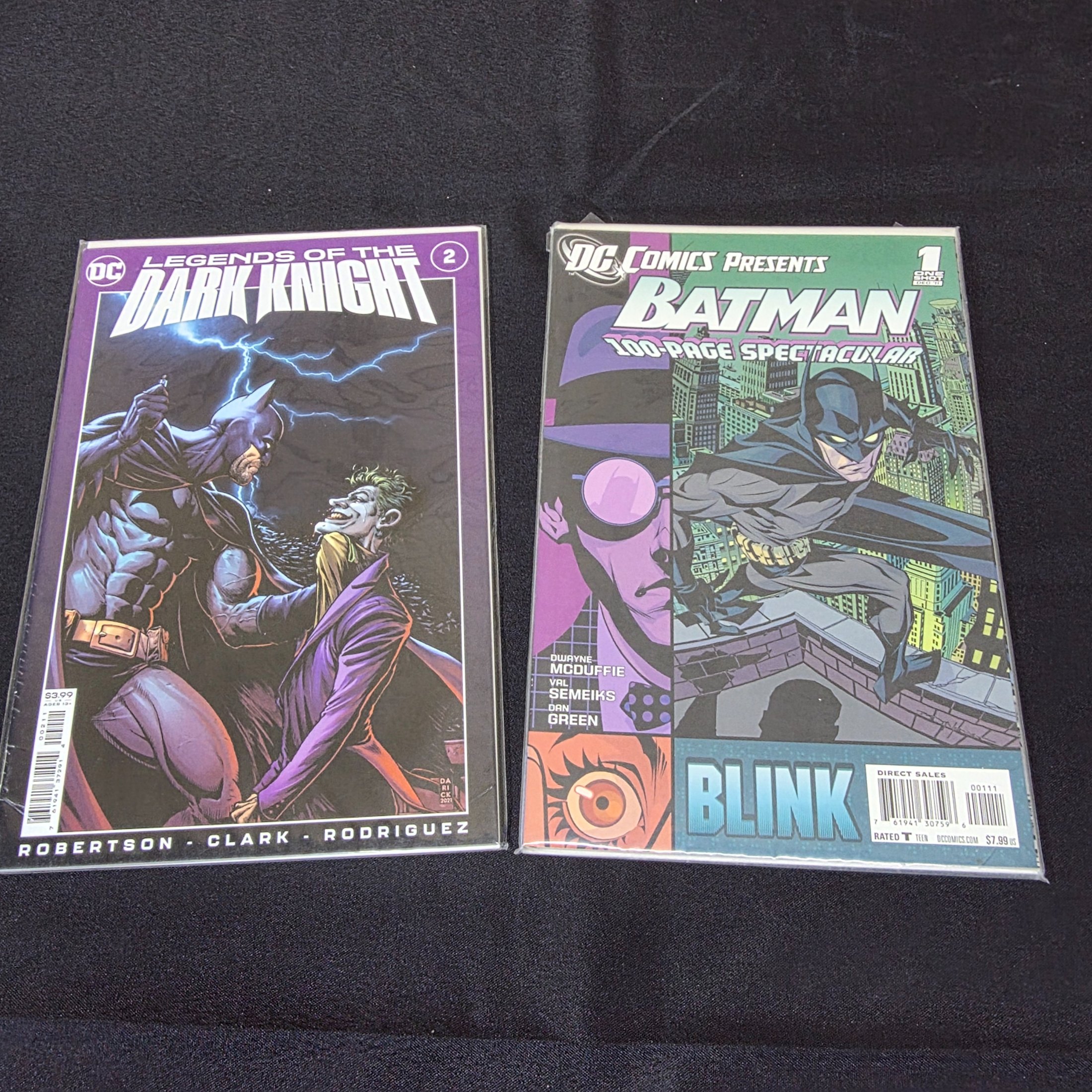 A lot of two DC Comics featuring Batman, including "Legends of the Dark Knight" issue 2 and "DC Comics Presents Batman 100-Page Spectacular" issue 1 from December 2011.