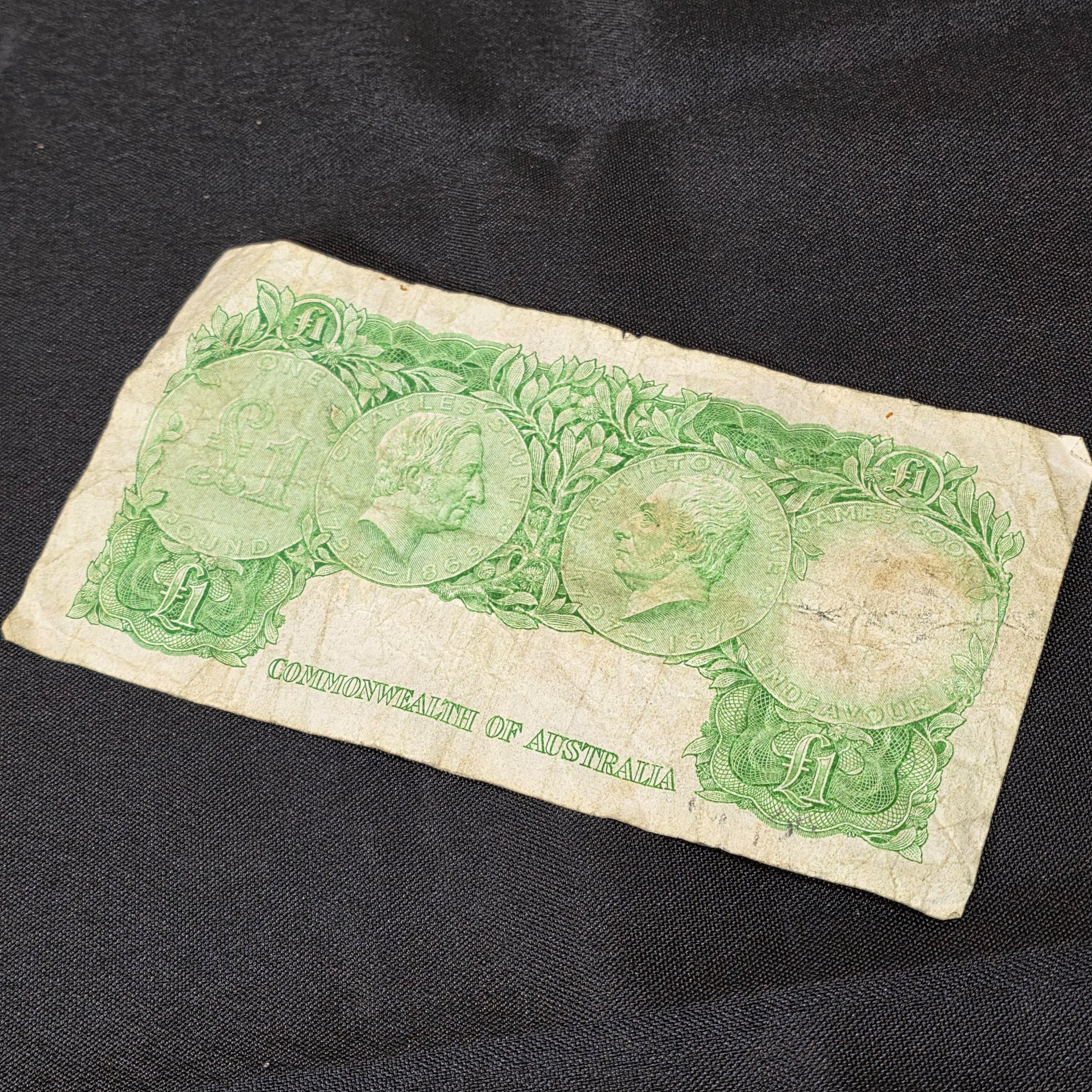 A vintage Australian One Pound banknote featuring Queen Elizabeth II, issued by the Commonwealth of Australia during the mid-20th century. - View 2