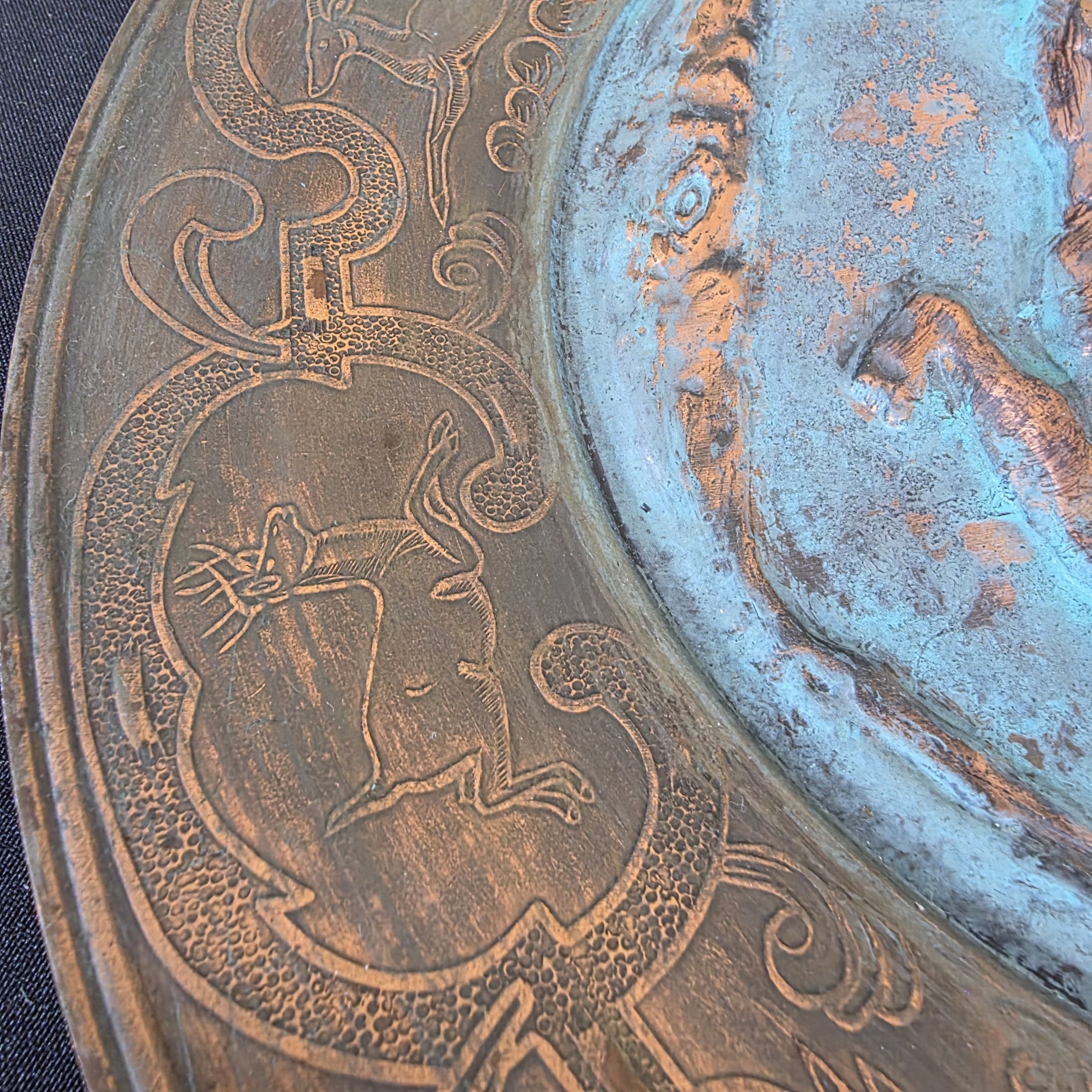 A collection of three vintage decorative wall plates, including a wooden plate with a Polish eagle crest and two copper or bronze plates featuring classical hunting and musical figures. - View 8
