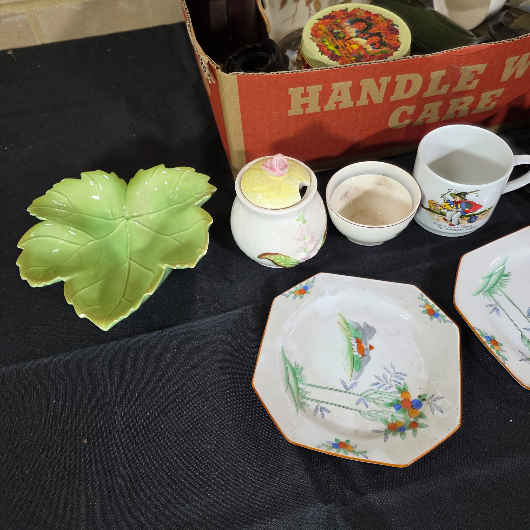 A diverse collection of vintage and antique homewares and decorative items, encompassing ceramics, metalware, glass, and wooden objects, presented as a mixed lot. - View 5