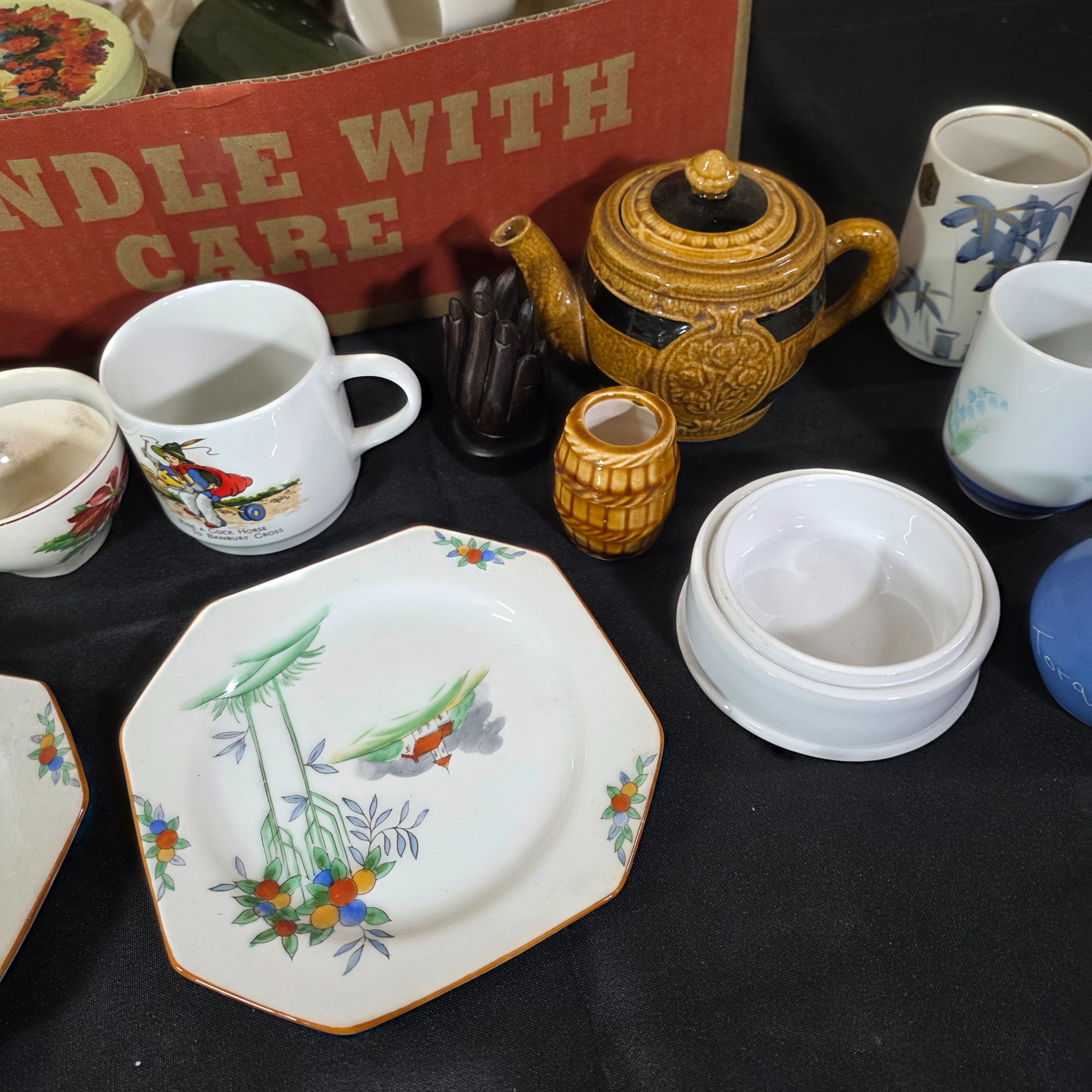 A diverse collection of vintage and antique homewares and decorative items, encompassing ceramics, metalware, glass, and wooden objects, presented as a mixed lot. - View 6