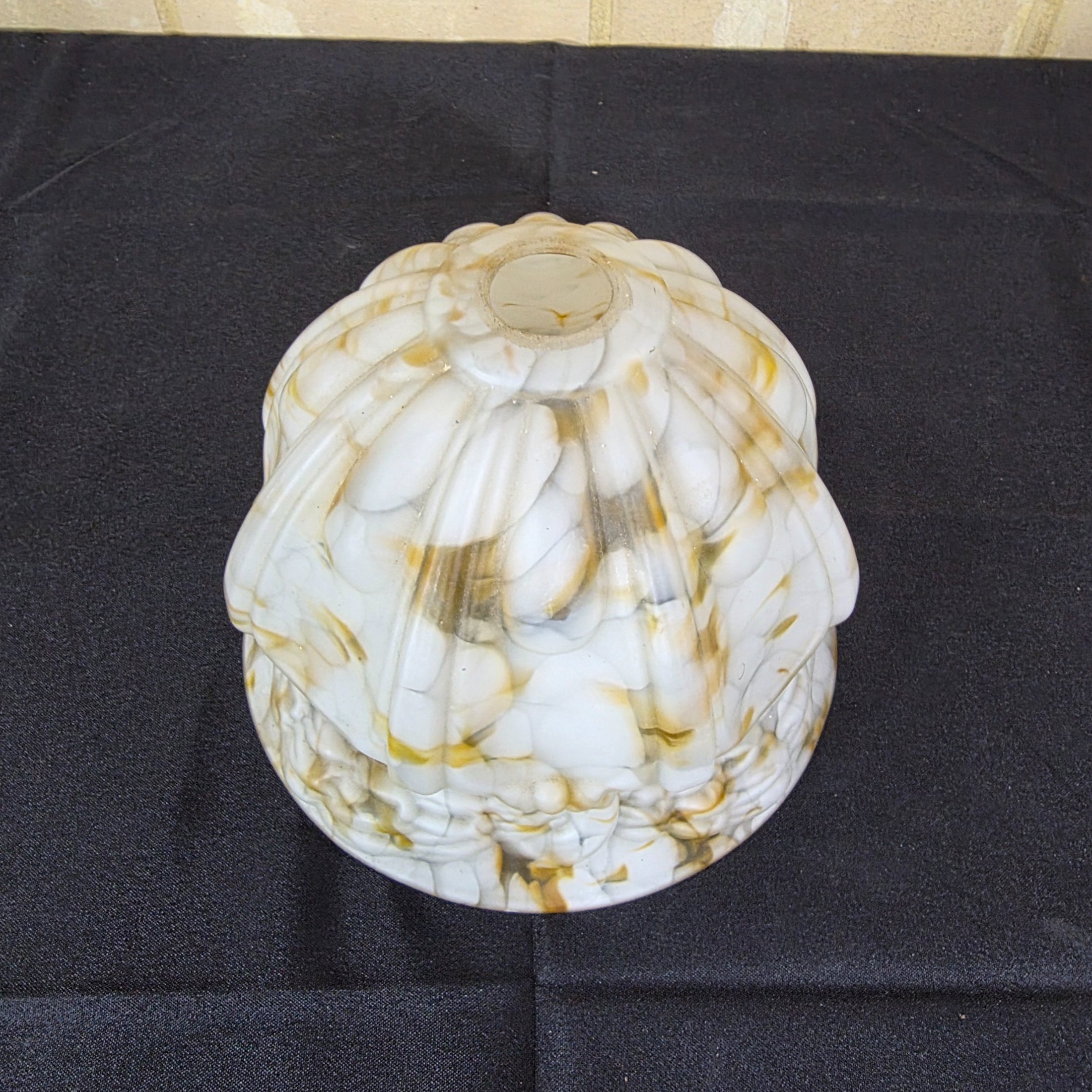 A vintage decorative glass light shade, featuring a marbled white and amber slag glass pattern with a fluted, ruffled design, circa mid-20th century. - View 2