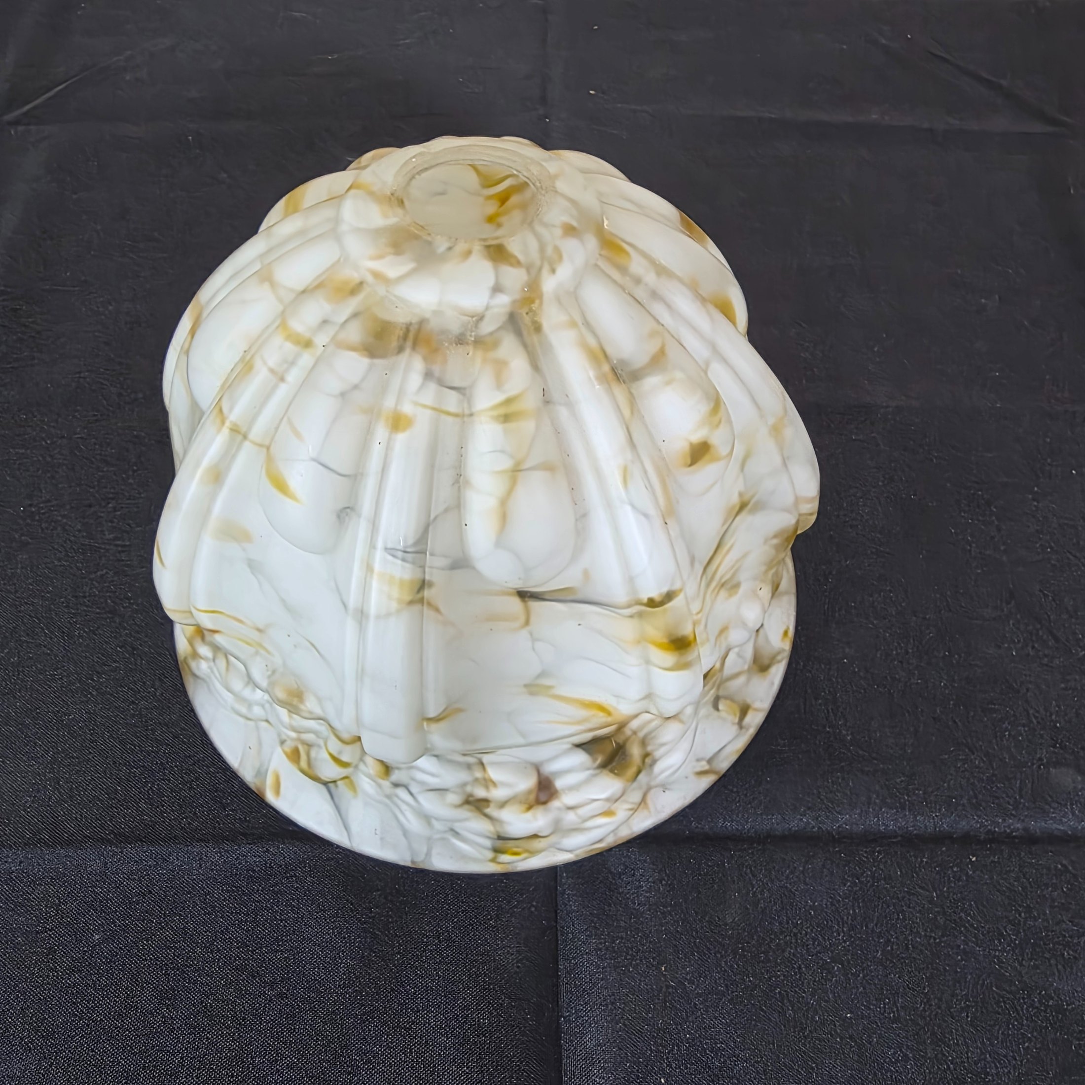 A vintage decorative glass light shade, featuring a marbled white and amber slag glass pattern with a fluted, ruffled design, circa mid-20th century. - View 3