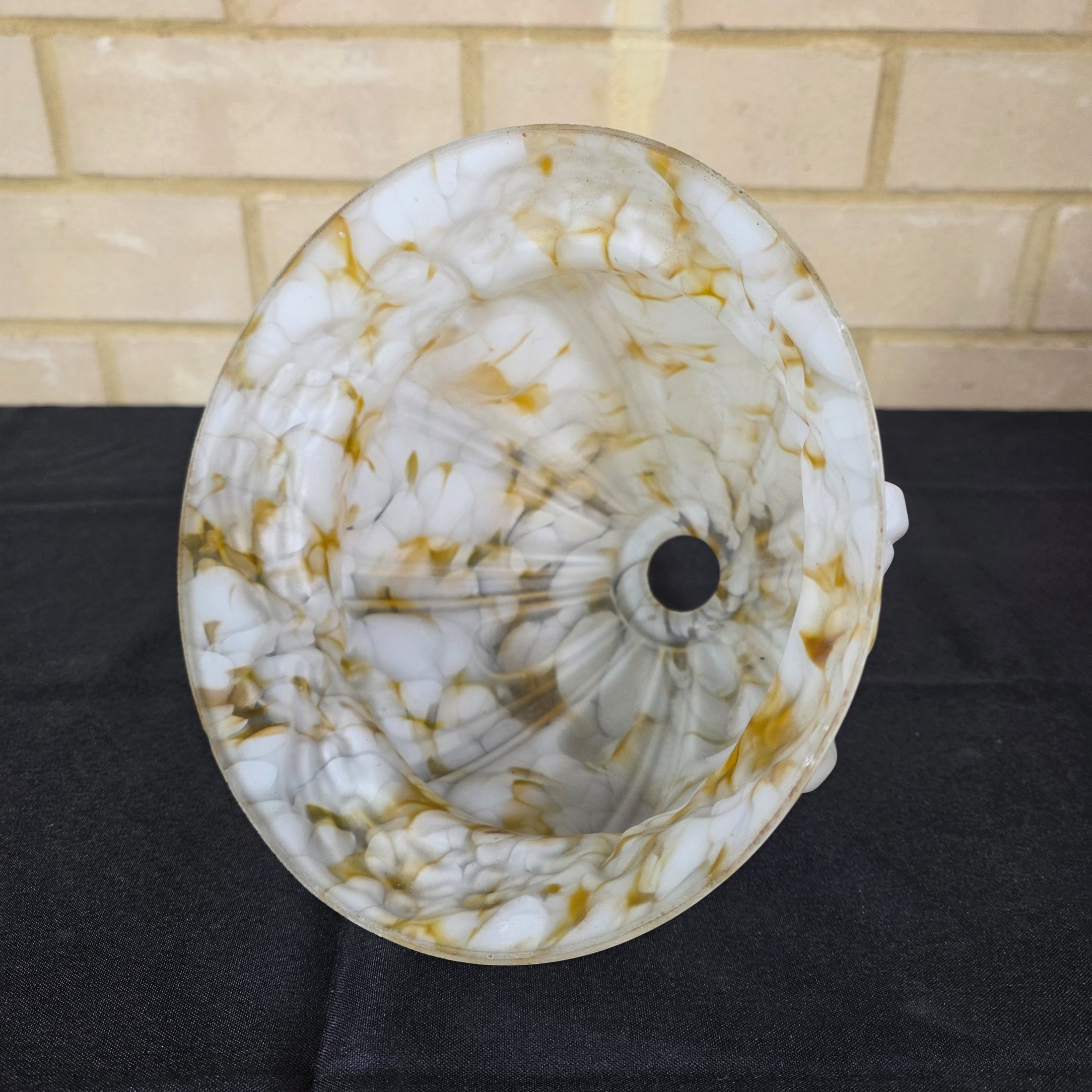 A vintage decorative glass light shade, featuring a marbled white and amber slag glass pattern with a fluted, ruffled design, circa mid-20th century. - View 4