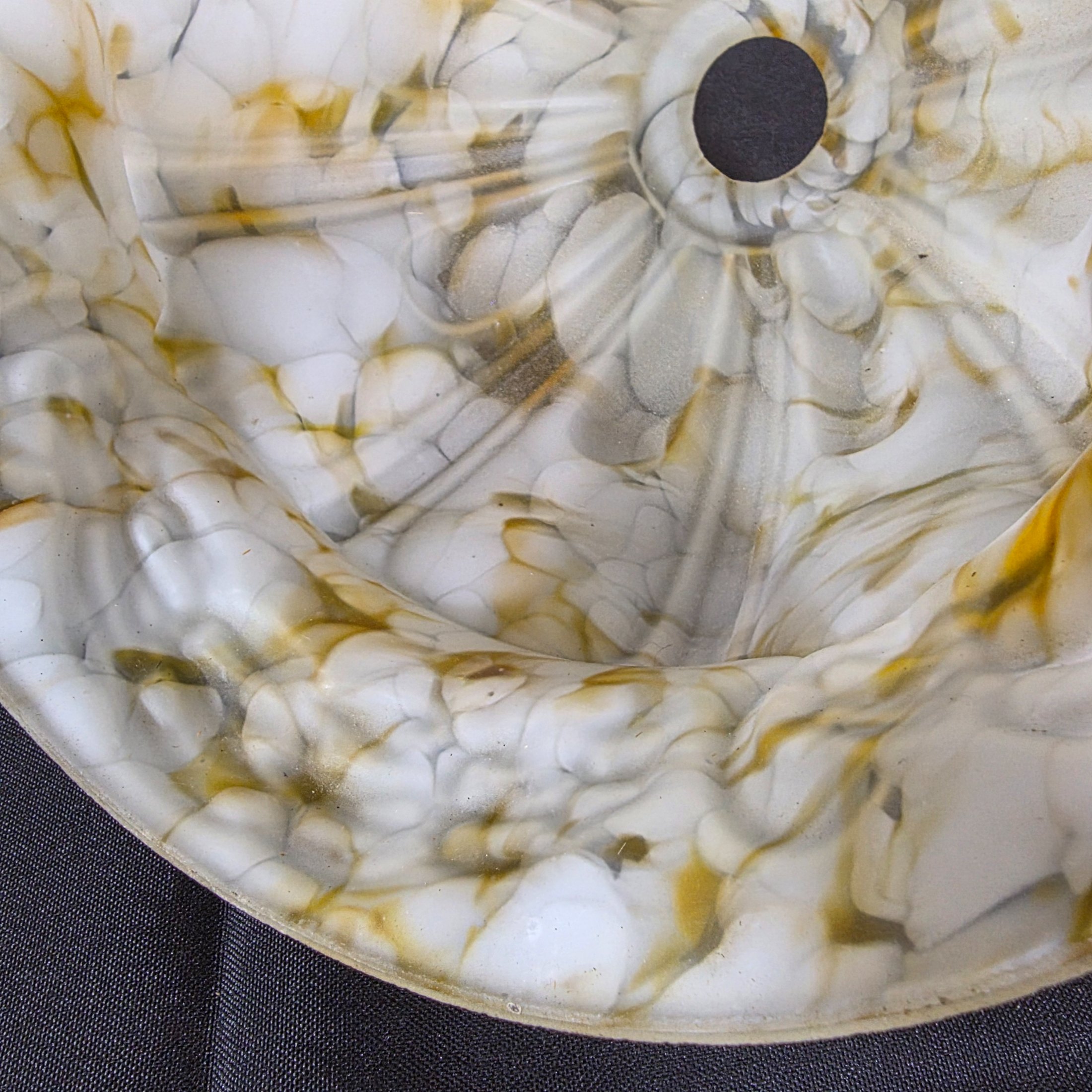 A vintage decorative glass light shade, featuring a marbled white and amber slag glass pattern with a fluted, ruffled design, circa mid-20th century. - View 5