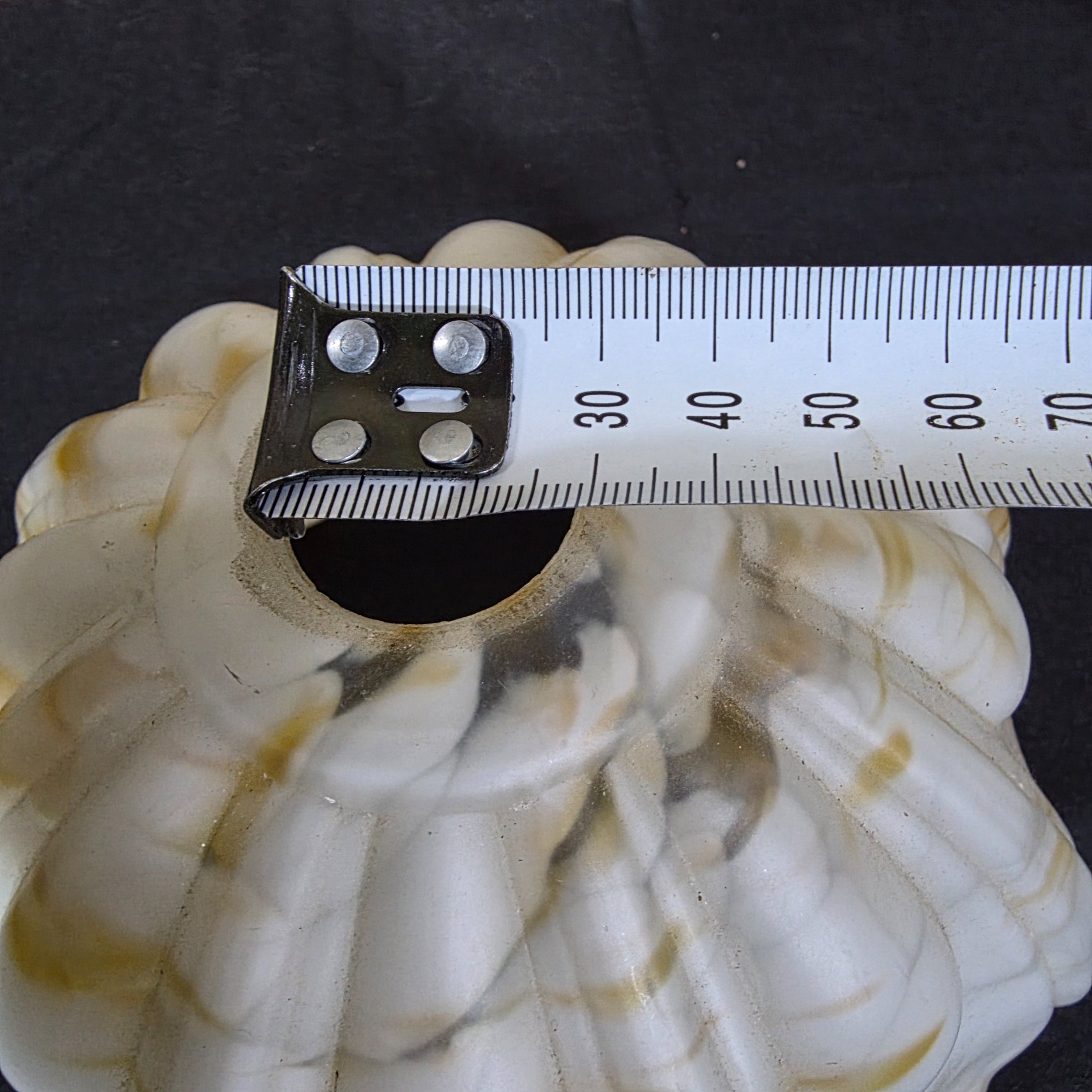 A vintage decorative glass light shade, featuring a marbled white and amber slag glass pattern with a fluted, ruffled design, circa mid-20th century. - View 7