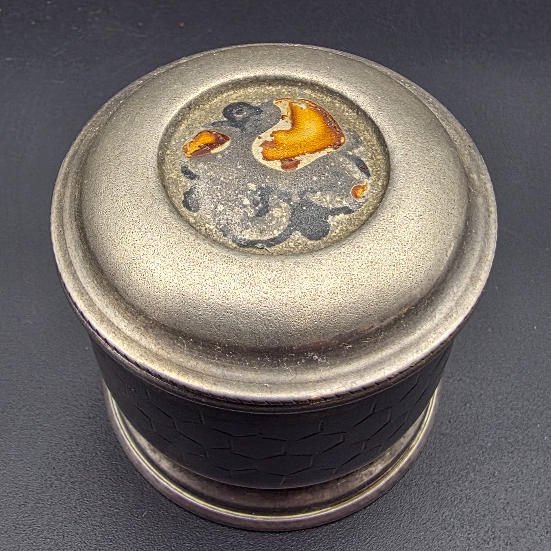 A collection of four vintage silver-toned items, including a sterling silver napkin ring, a second napkin ring, a ribbed cup, and a lidded box, dating from the early to mid-20th century. - View 5