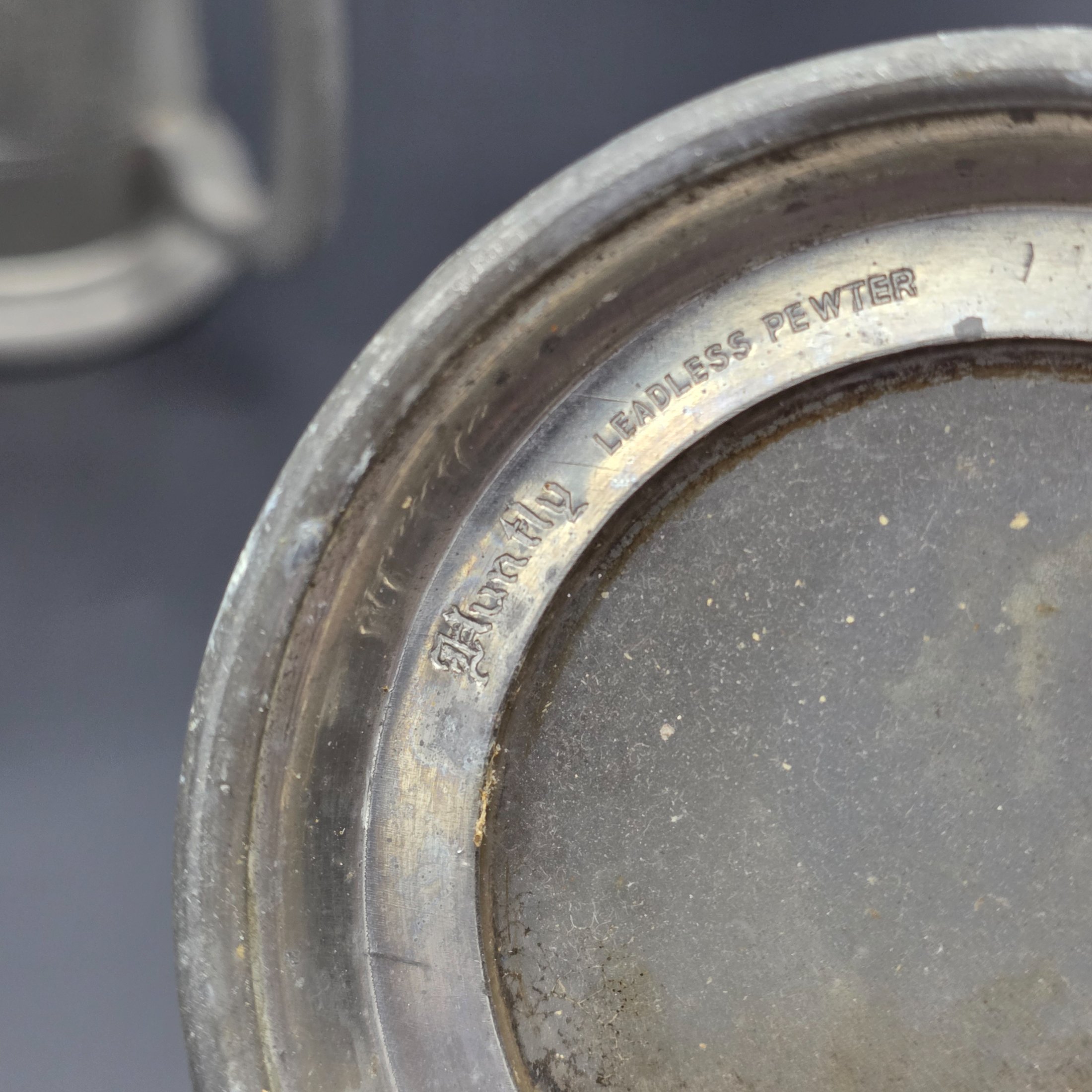 A collection featuring three vintage pewter tankards and two small pewter knight figurines, showcasing different manufacturing origins and finishes from the mid to late 20th century. - View 7