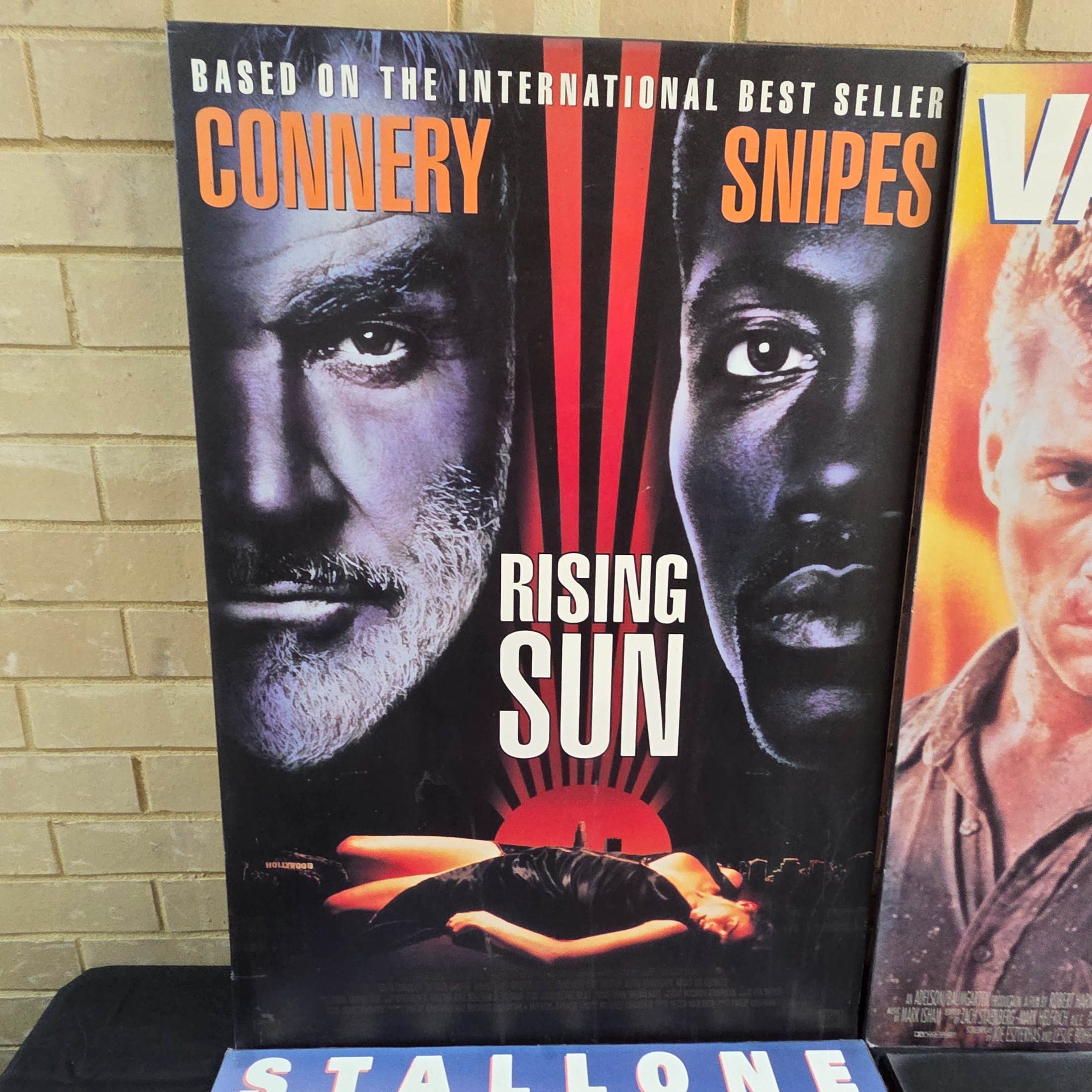 Four mounted original movie posters from the early 1990s, featuring classic action films 'Rising Sun', 'Nowhere to Run', 'Cliffhanger', and 'The Fugitive'. - View 2