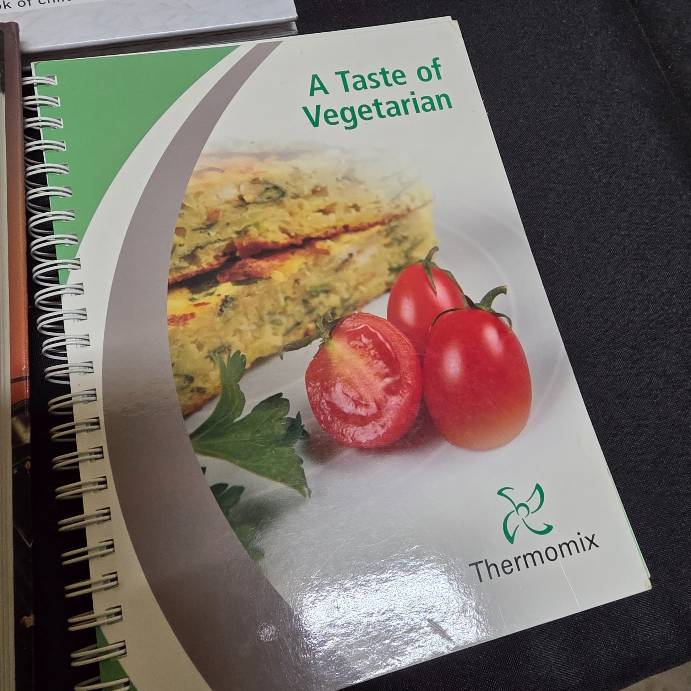 A diverse collection of thirteen pre-owned books, encompassing a range of genres from Australian history and finance to popular cookbooks and reference materials. - View 3