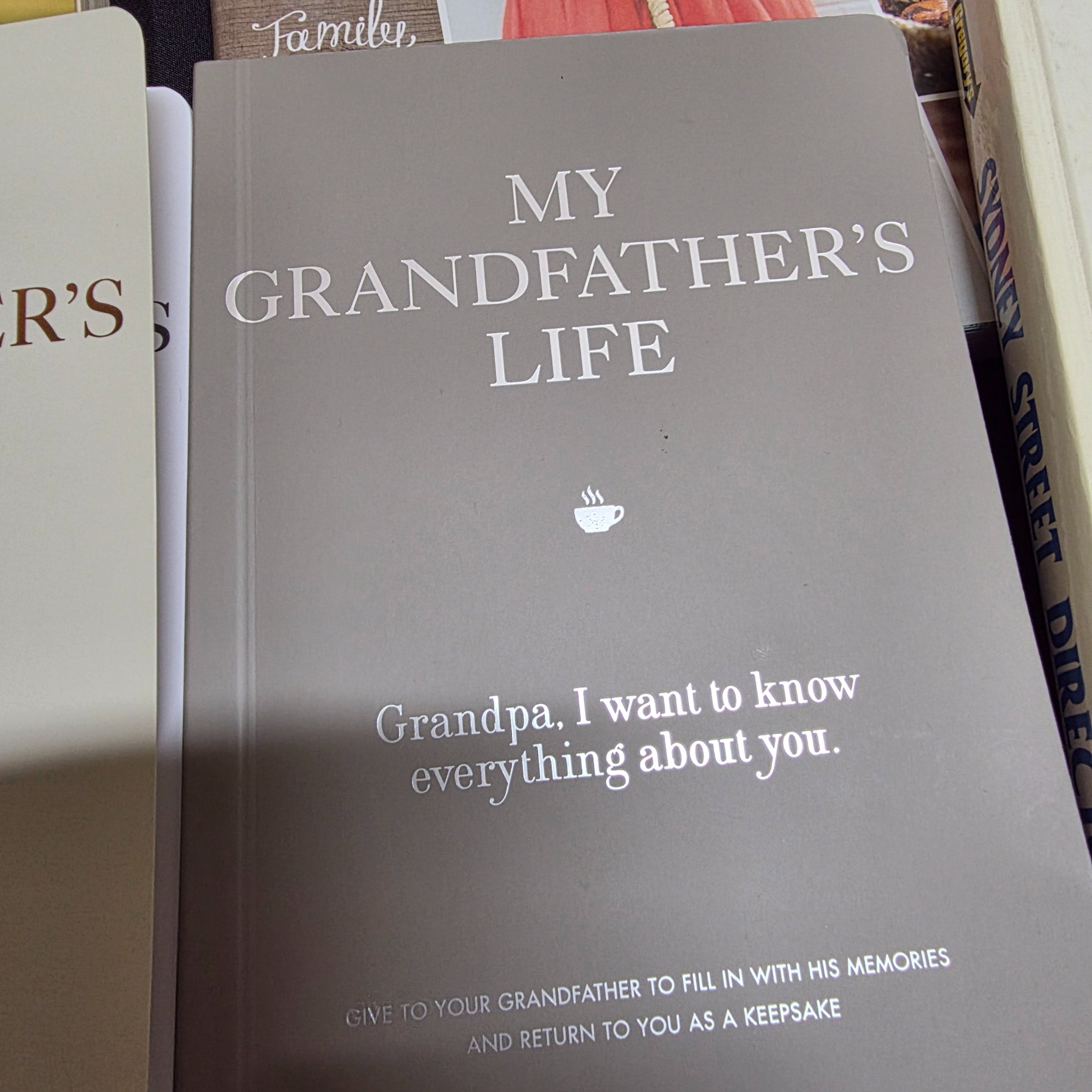 A diverse collection of thirteen pre-owned books, encompassing a range of genres from Australian history and finance to popular cookbooks and reference materials. - View 8