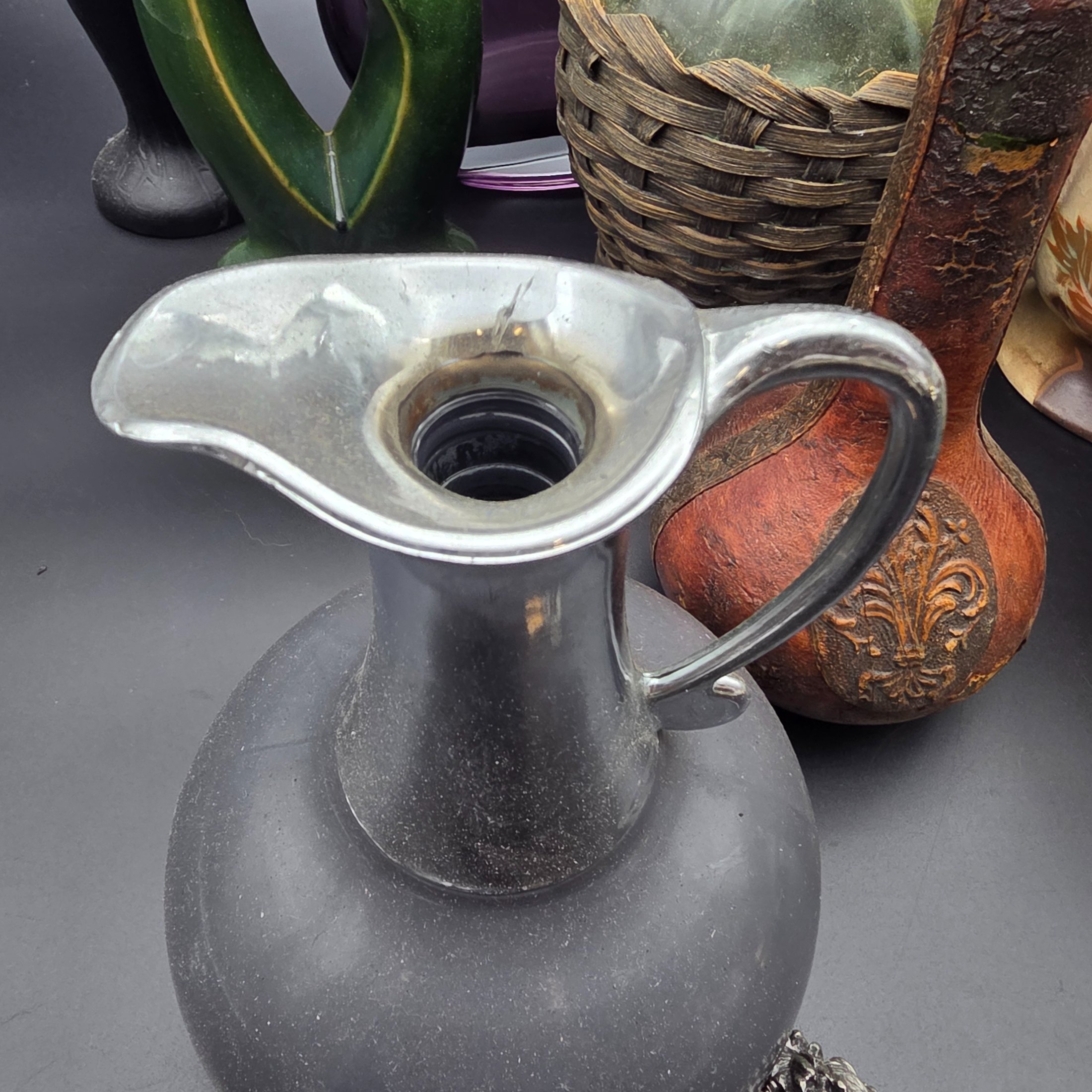 A mixed lot of vintage decorative items including wicker and leather-wrapped glass bottles, ceramic vases from Hamilton England, and an empty Otard XO Cognac bottle. - View 4