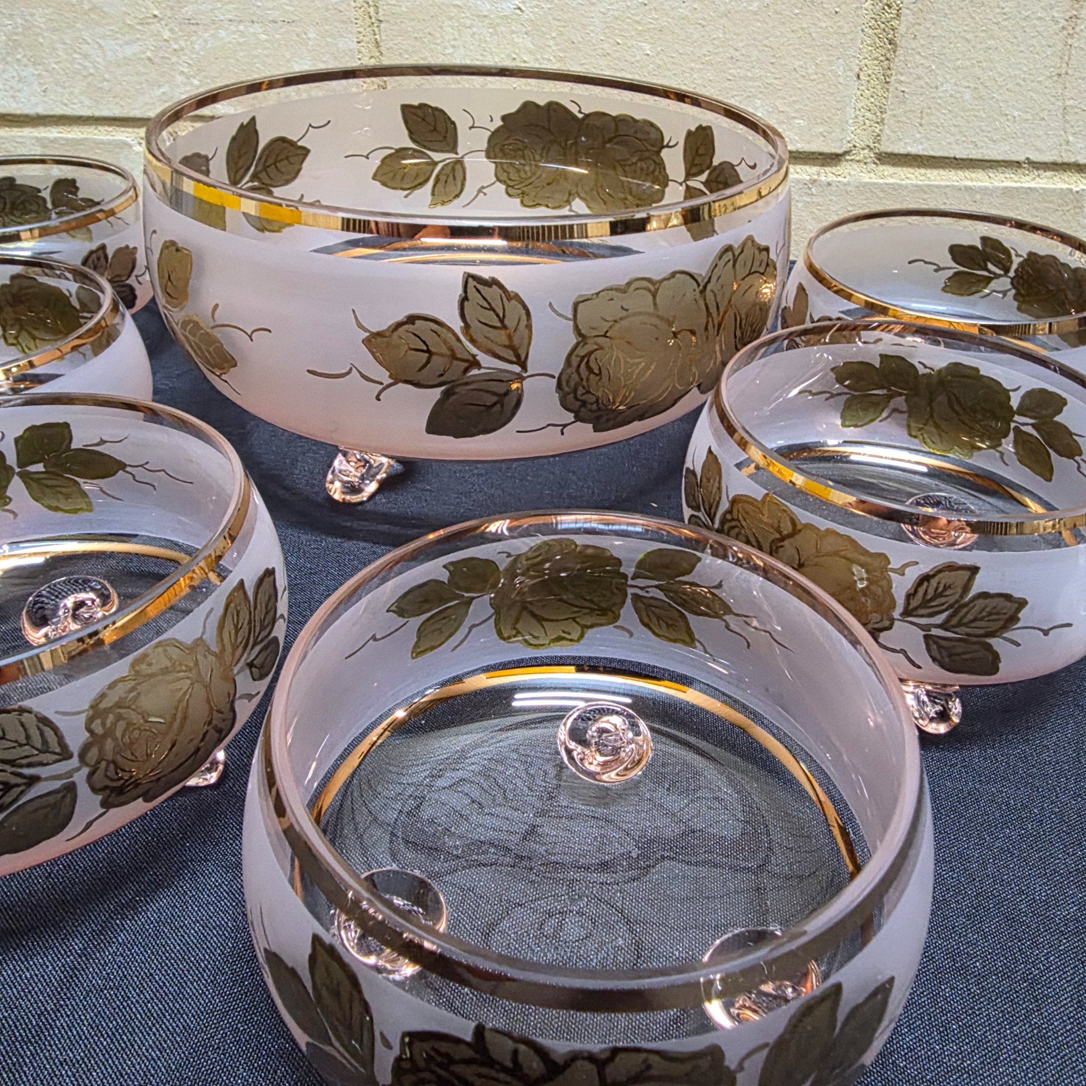 A charming vintage frosted pink and gold glass dessert set, comprising one large serving bowl and six smaller individual bowls, likely dating from the mid-20th century. - View 4
