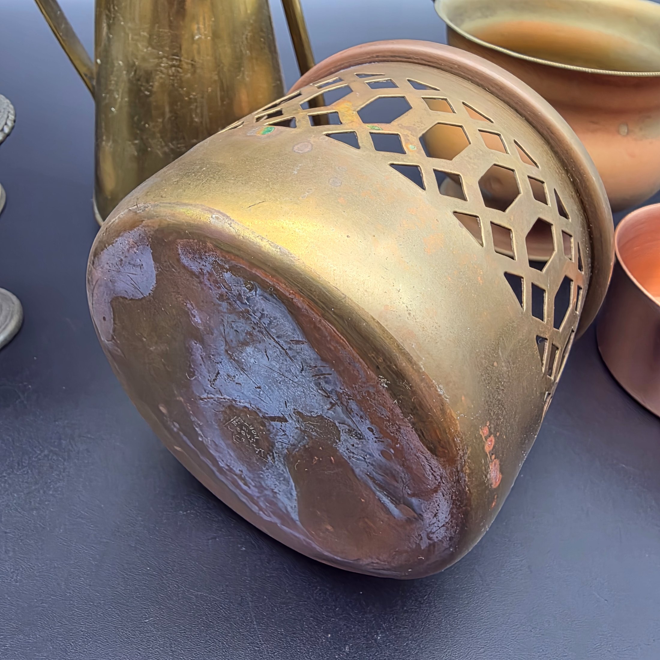 A varied collection of vintage brass and copper metalware, featuring decorative and functional items for home display. - View 6