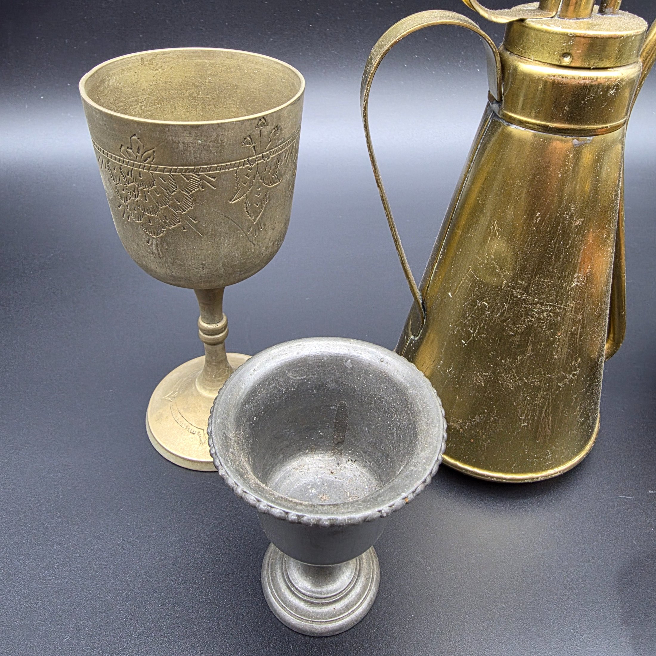 A varied collection of vintage brass and copper metalware, featuring decorative and functional items for home display. - View 7