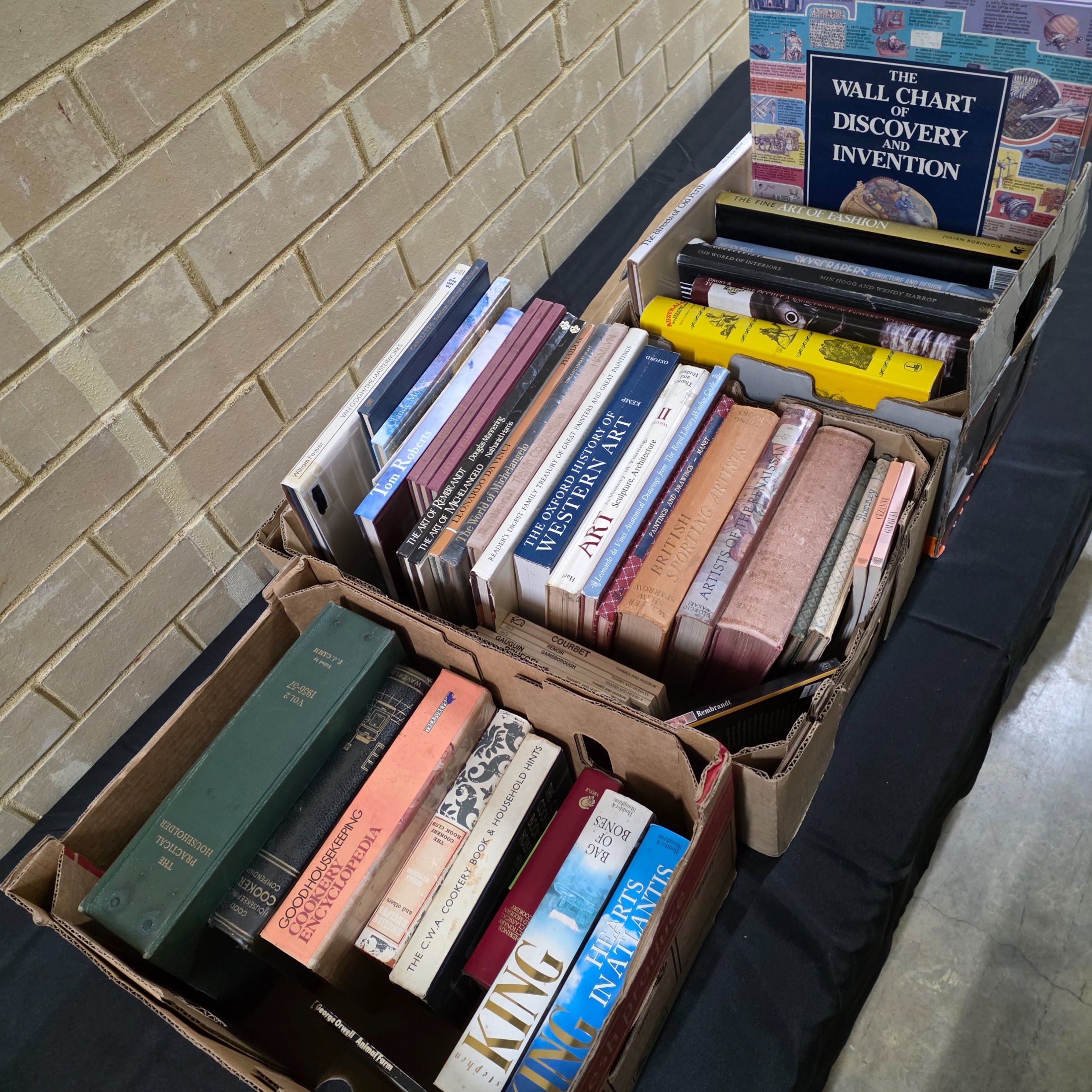 3x Boxes of Cooking, Art & Local History Assorted Fiction Books — Lot 132, photograph 1
