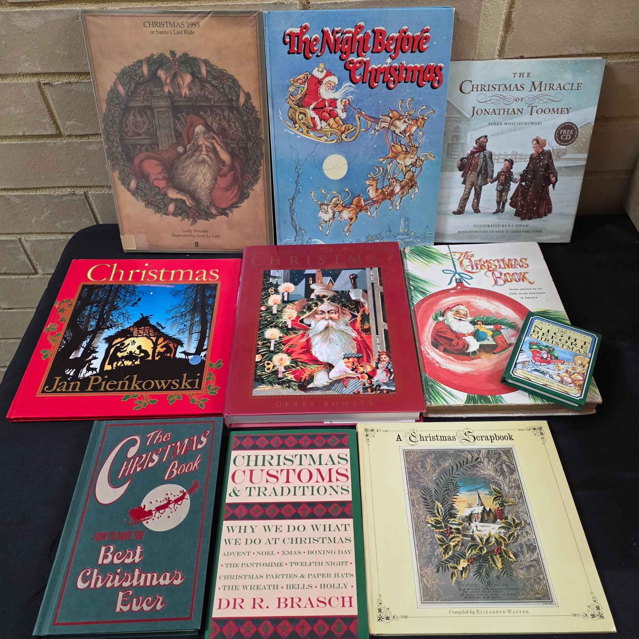 Lot of Assorted Christmas Books incl. 'The World Encyclopedia of Christmas' by Gerry Bowler — Lot 136, photograph 1