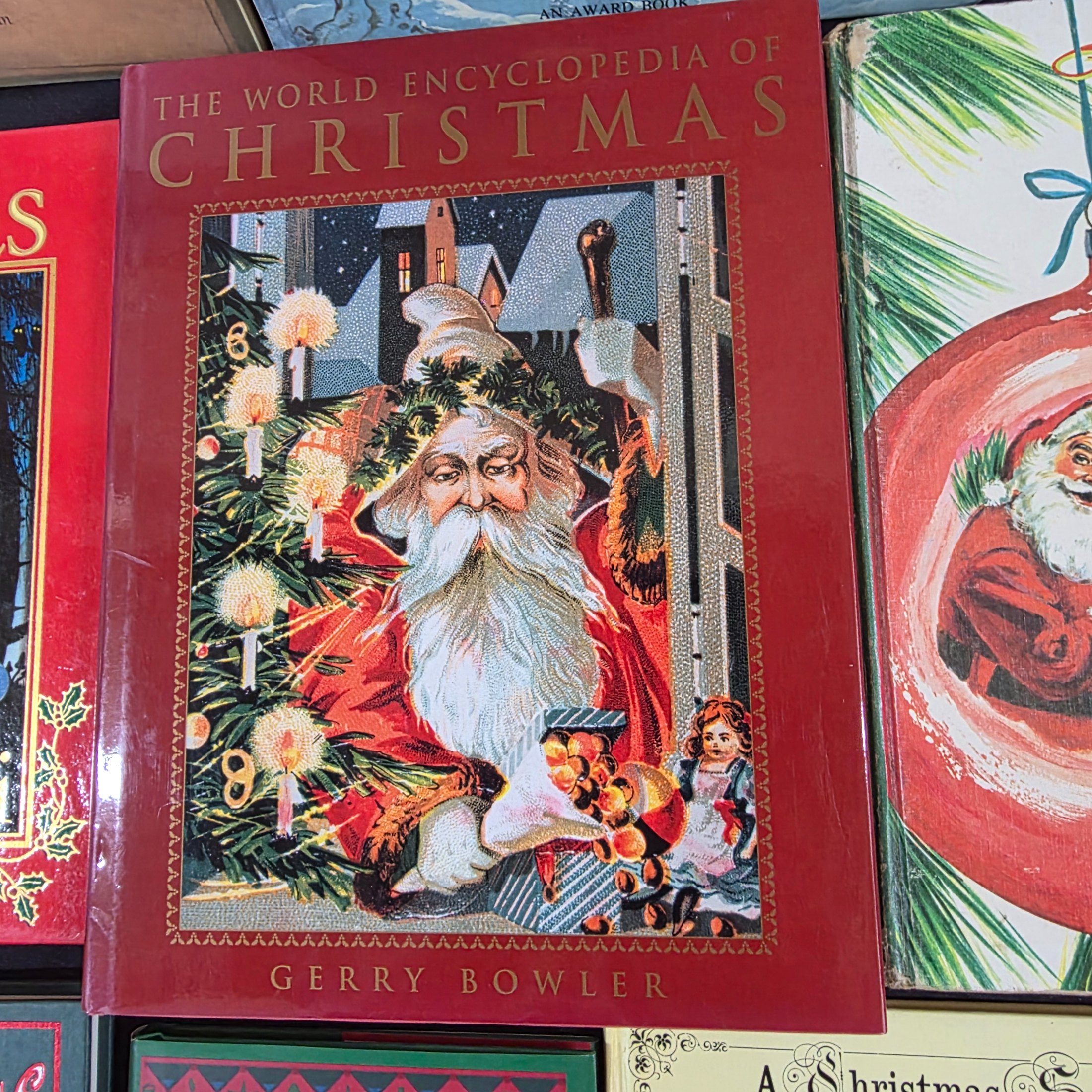 Lot of Assorted Christmas Books incl. 'The World Encyclopedia of Christmas' by Gerry Bowler — Lot 136, photograph 7