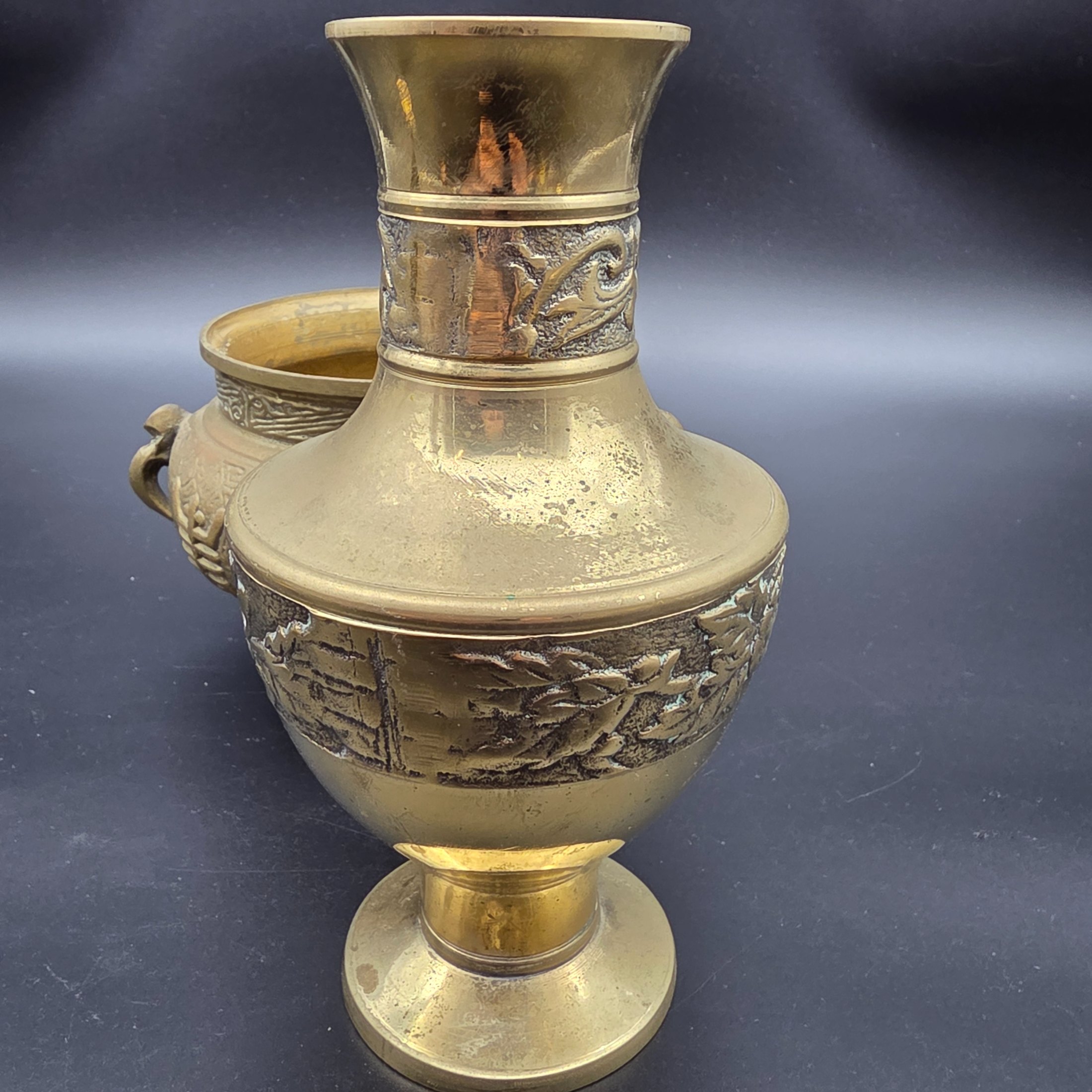 A collection of five assorted vintage brass ornamental pieces, including a goblet, vase, censer, and two smaller decorative items, all featuring intricate etchings and cast details. - View 8