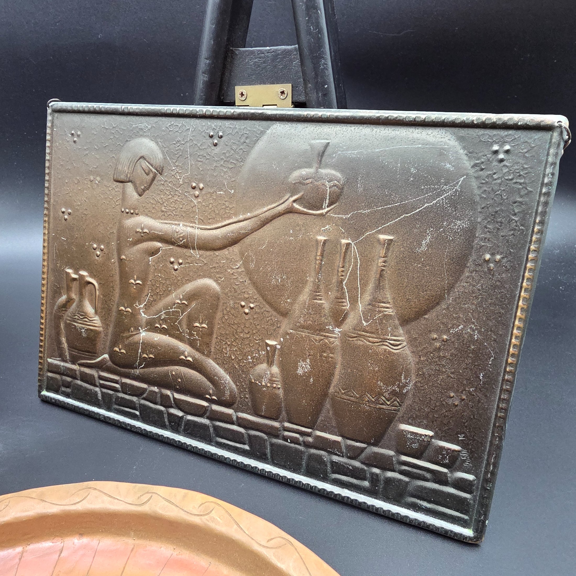 A lot of vintage decorative metalware comprising various brass and copper items, showcasing embossed and etched designs. - View 3