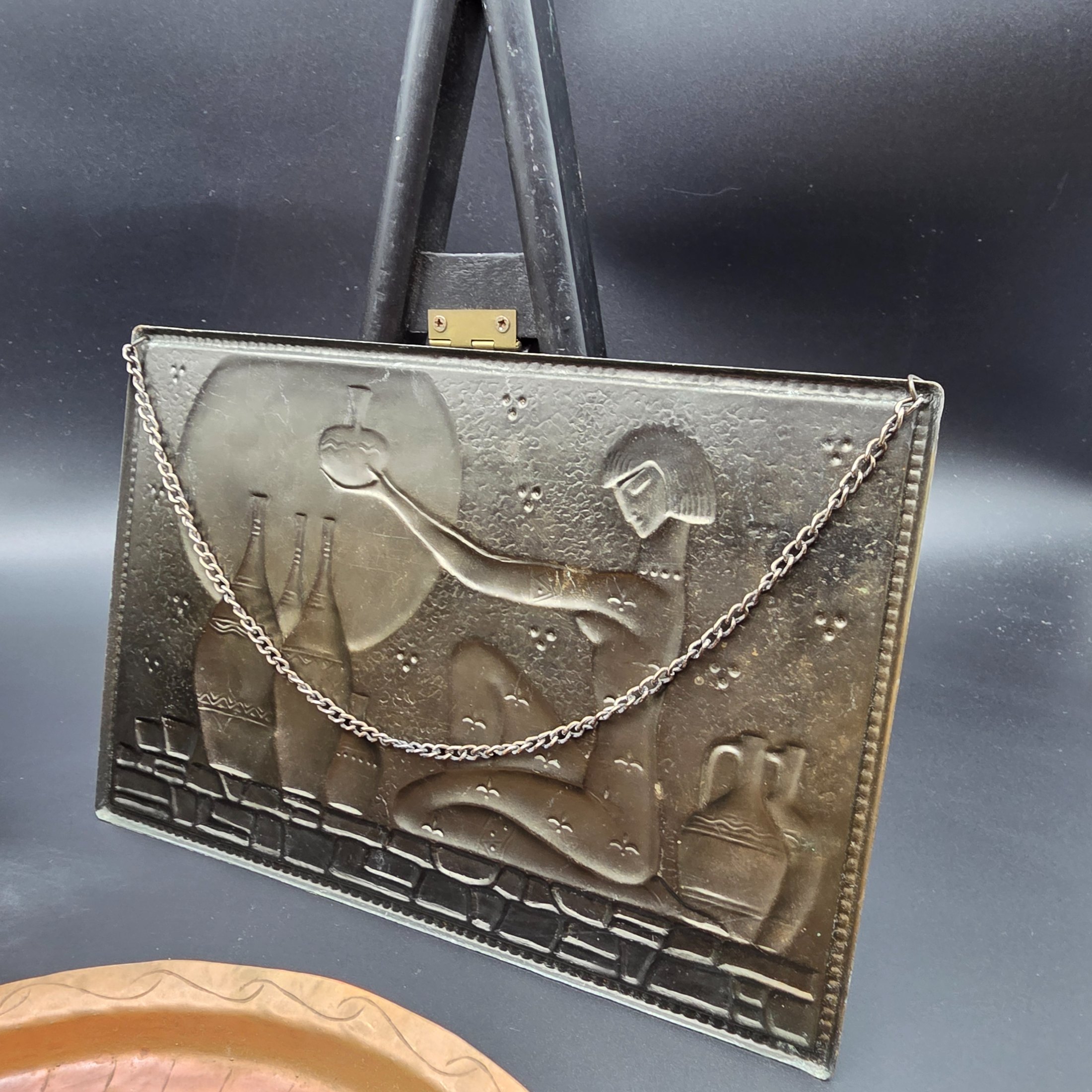 A lot of vintage decorative metalware comprising various brass and copper items, showcasing embossed and etched designs. - View 4