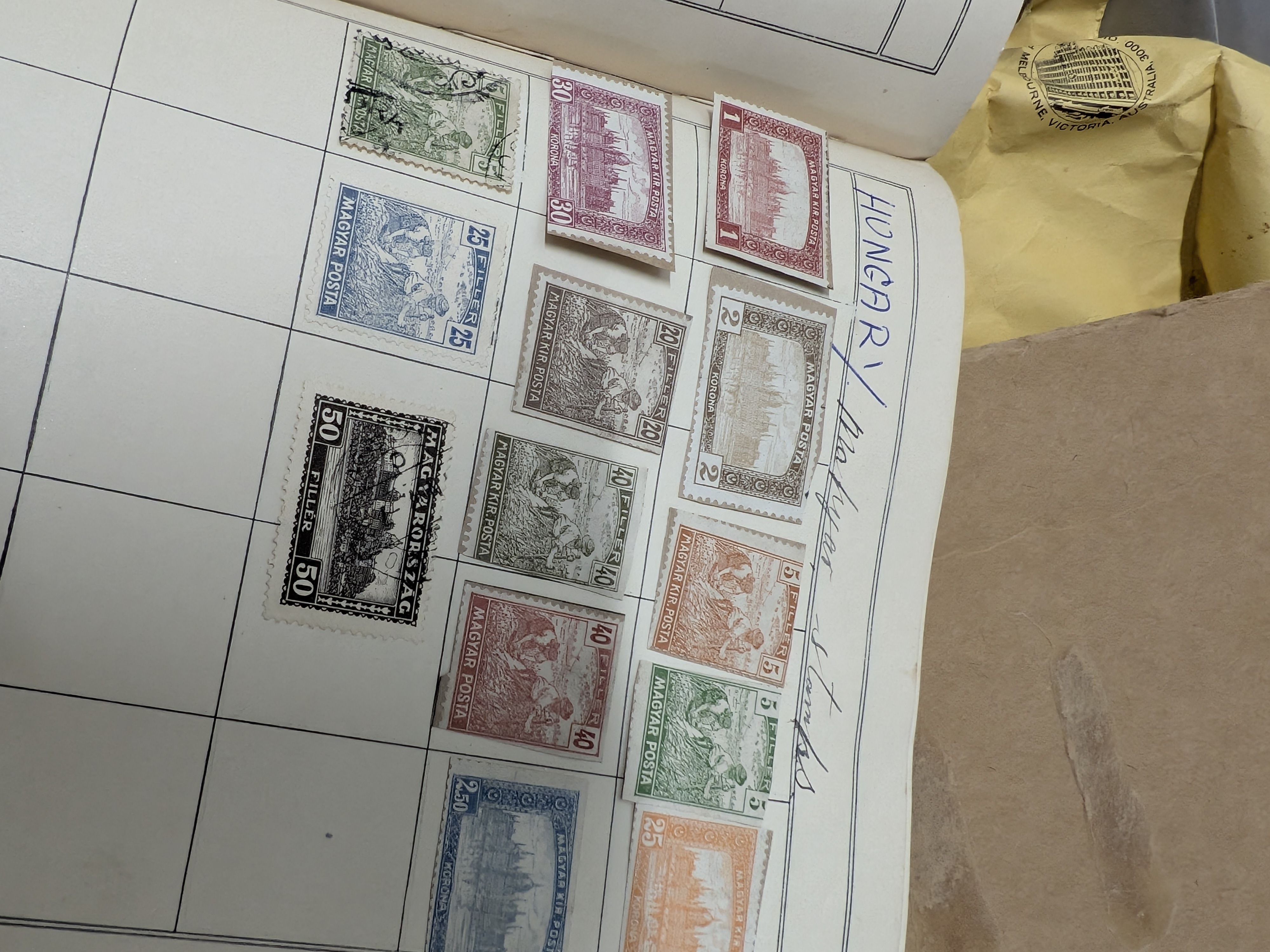 A substantial box lot containing a diverse collection of Australian and international postage stamps, housed in various albums and loose. - View 6